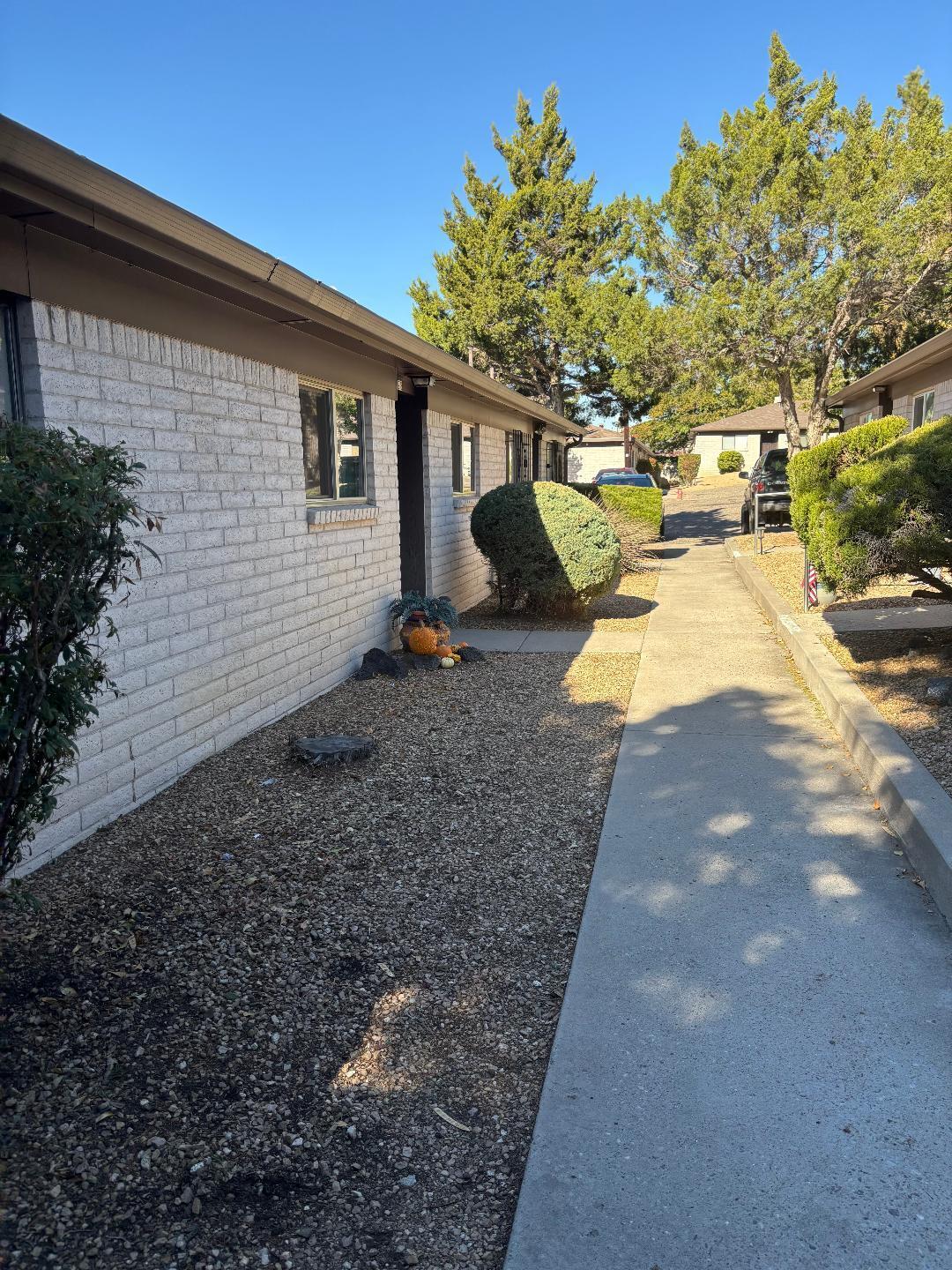 Villa Blanca Townhomes, rarely on the Market. Quiet and beautiful neighborhood, spacious area to walk around,  and close to shopping and schools.  Flooring replaced in the 2 bedrooms, 1 full bath, Large open Family room to private walled back yard.Low HOA dues, stove and refrigerator 2 years old, separate area for washer and dryer, pantry.