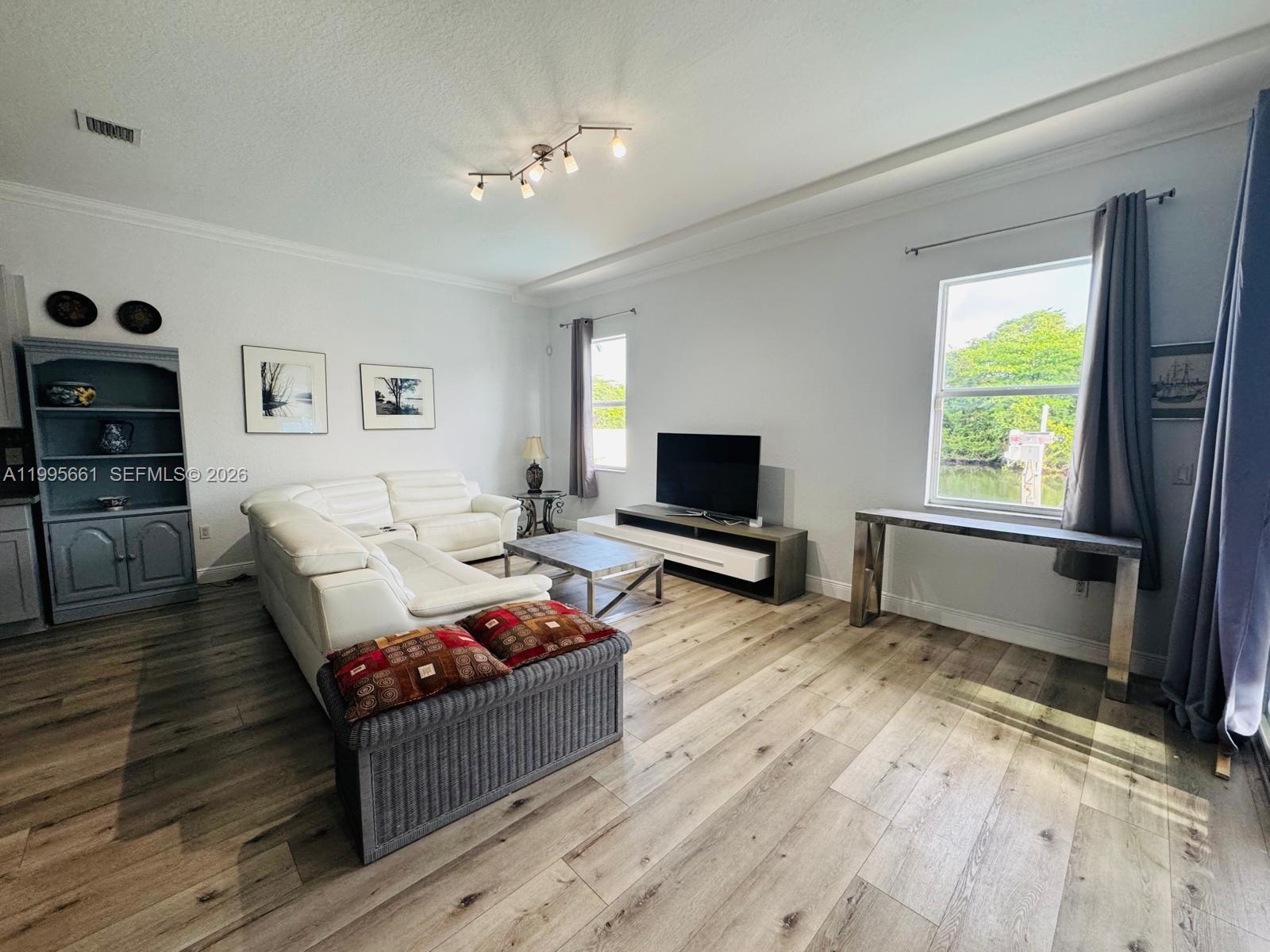 Spacious living room with panoramic views at 3041 44th St - Home in Dania Beach