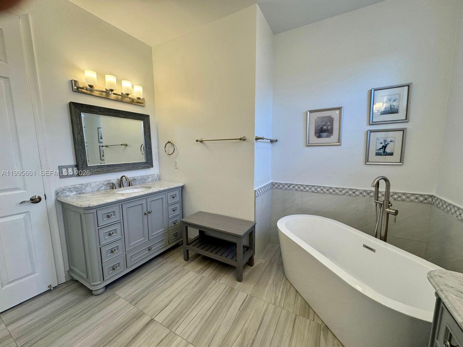 Well-appointed guest bedroom at 3041 44th St - Home in Dania Beach