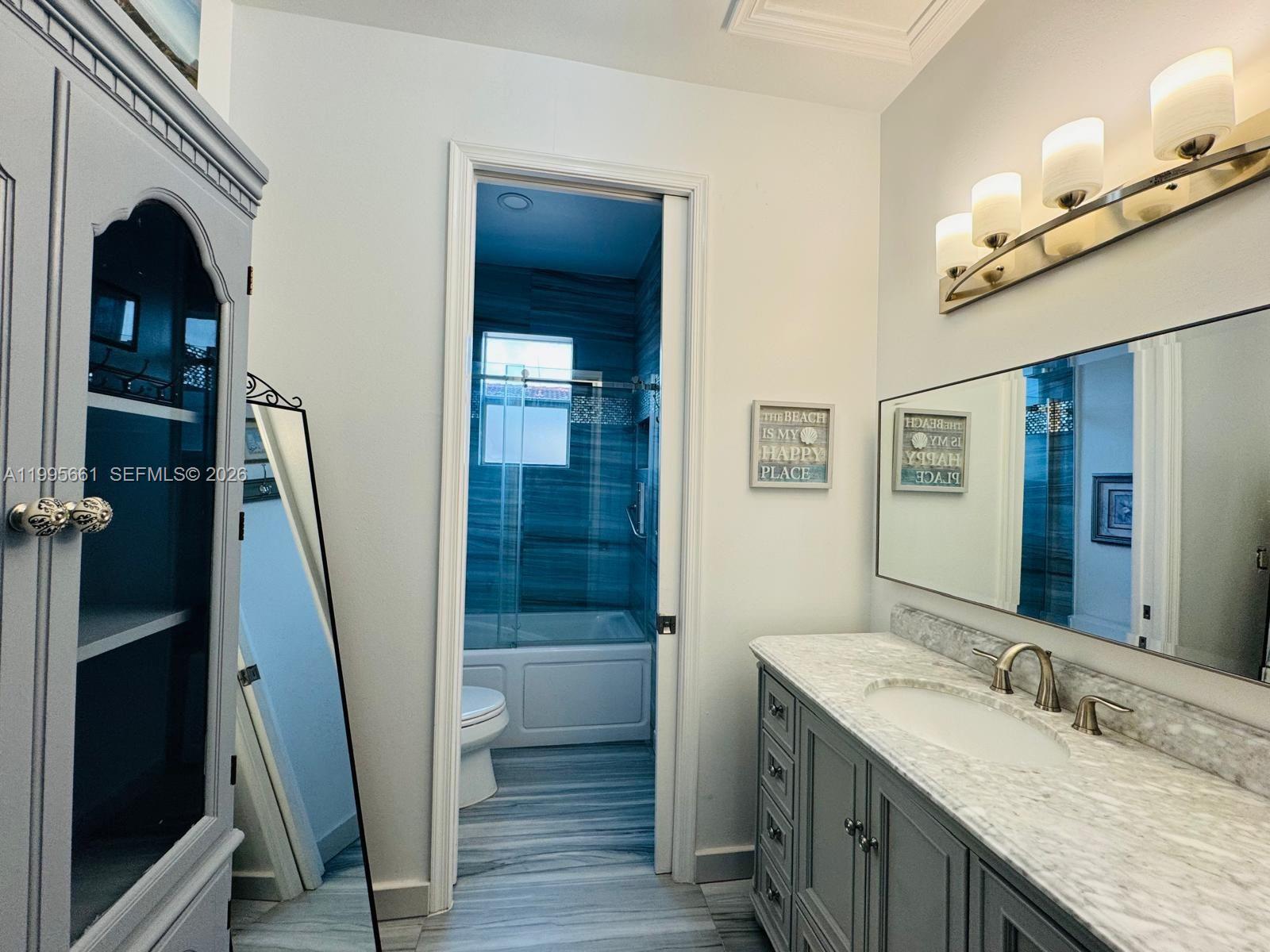 Resort-style pool and outdoor entertaining at 3041 44th St - Home in Dania Beach