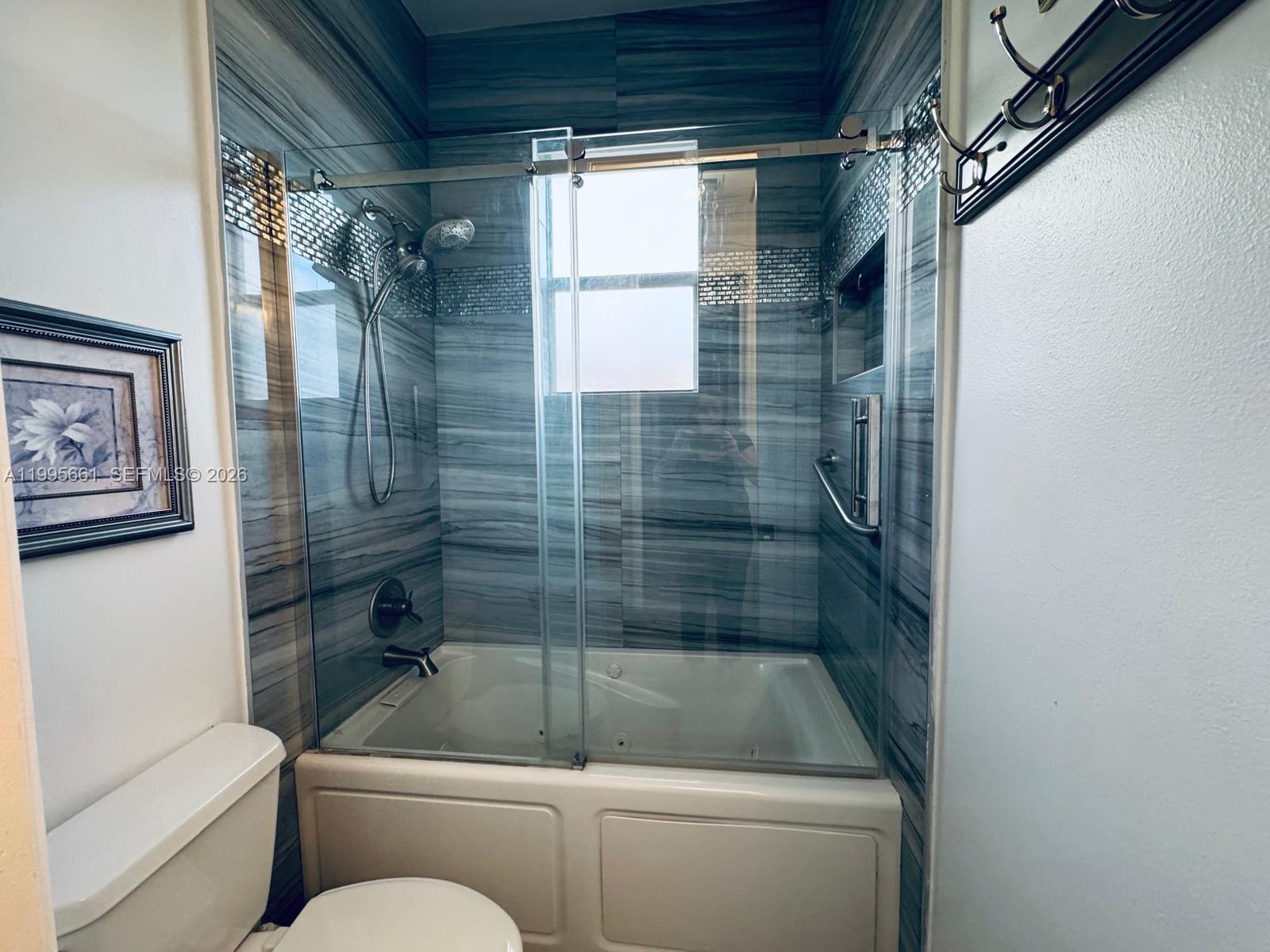 Well-appointed guest bedroom at 3041 44th St - Home in Dania Beach