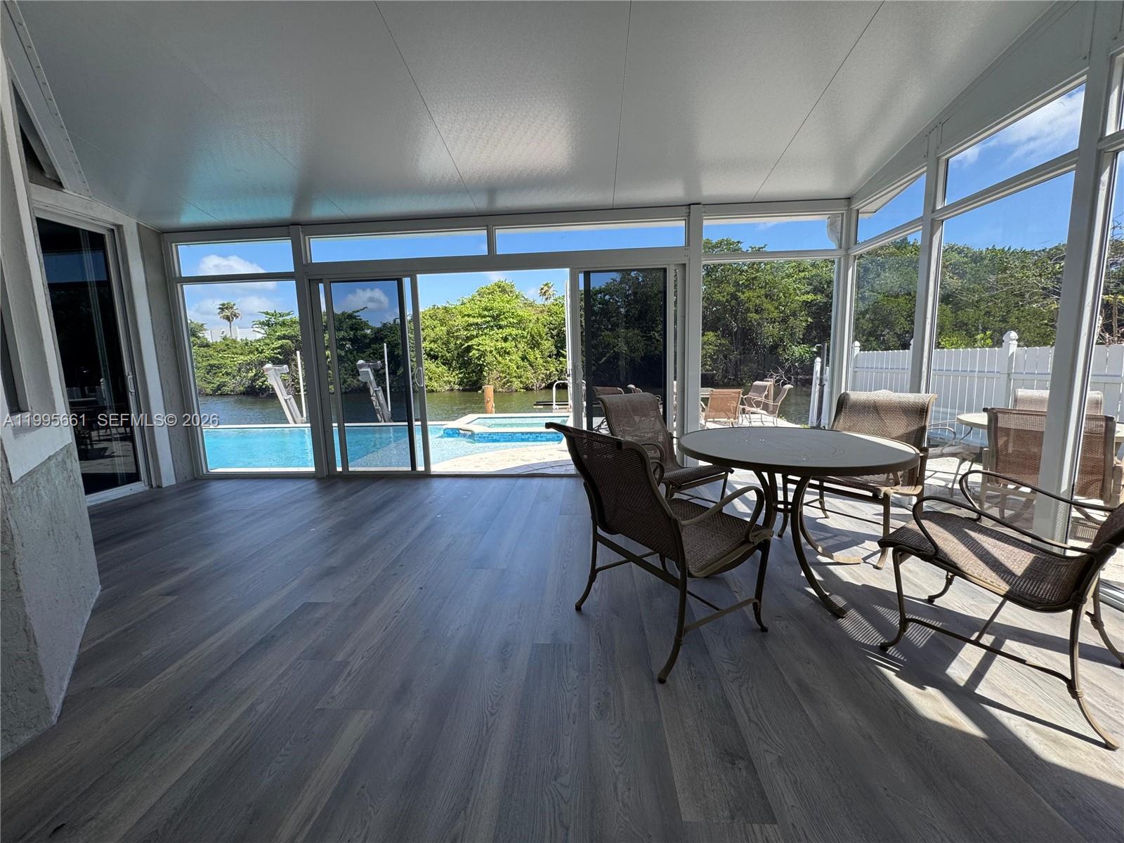 Resort-style pool and outdoor entertaining at 3041 44th St - Home in Dania Beach