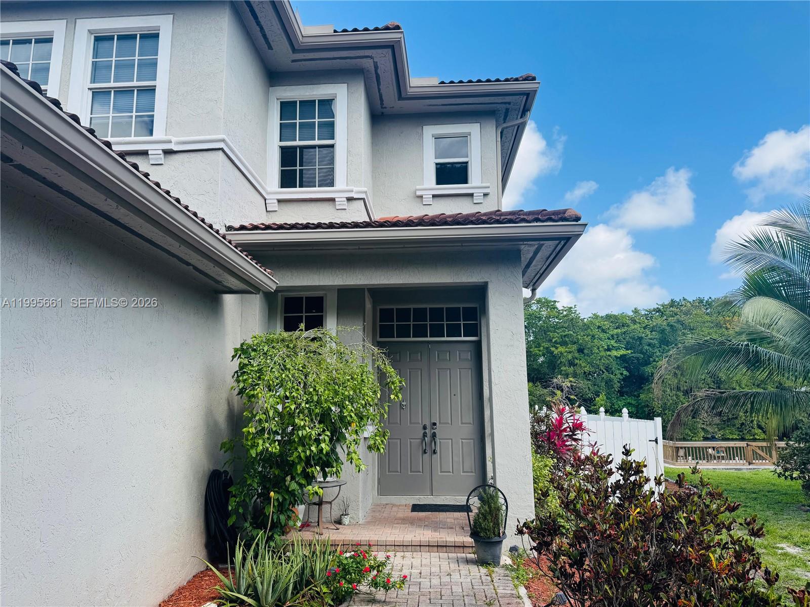 Resort-style pool and outdoor entertaining at 3041 44th St - Home in Dania Beach