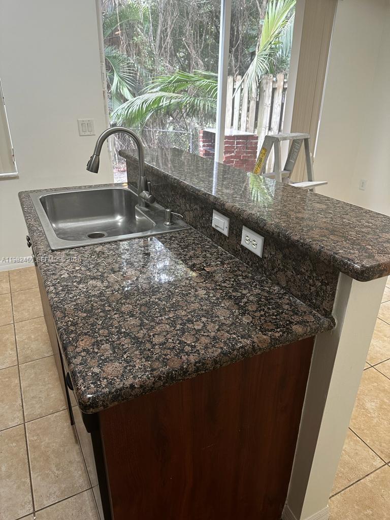 Open-concept living area at 3070 Red Mangrove Ln S - Townhouse in Dania Beach