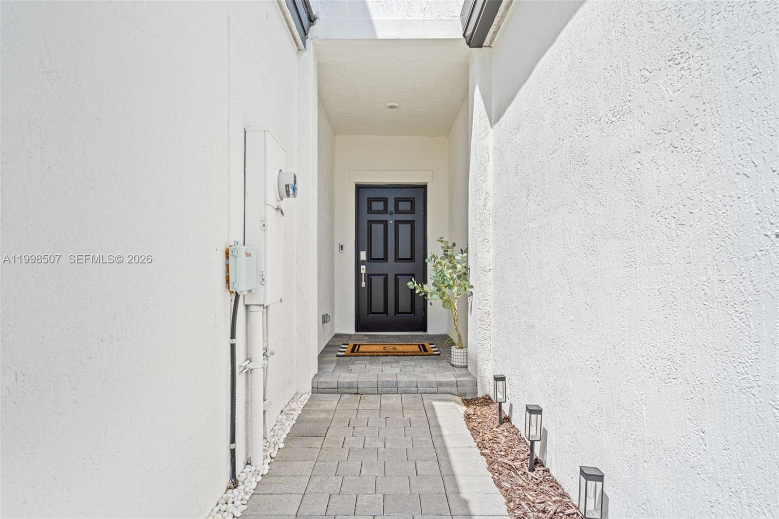 Modern kitchen with designer features at 4917 Oakmont Dr - Townhouse in Dania Beach