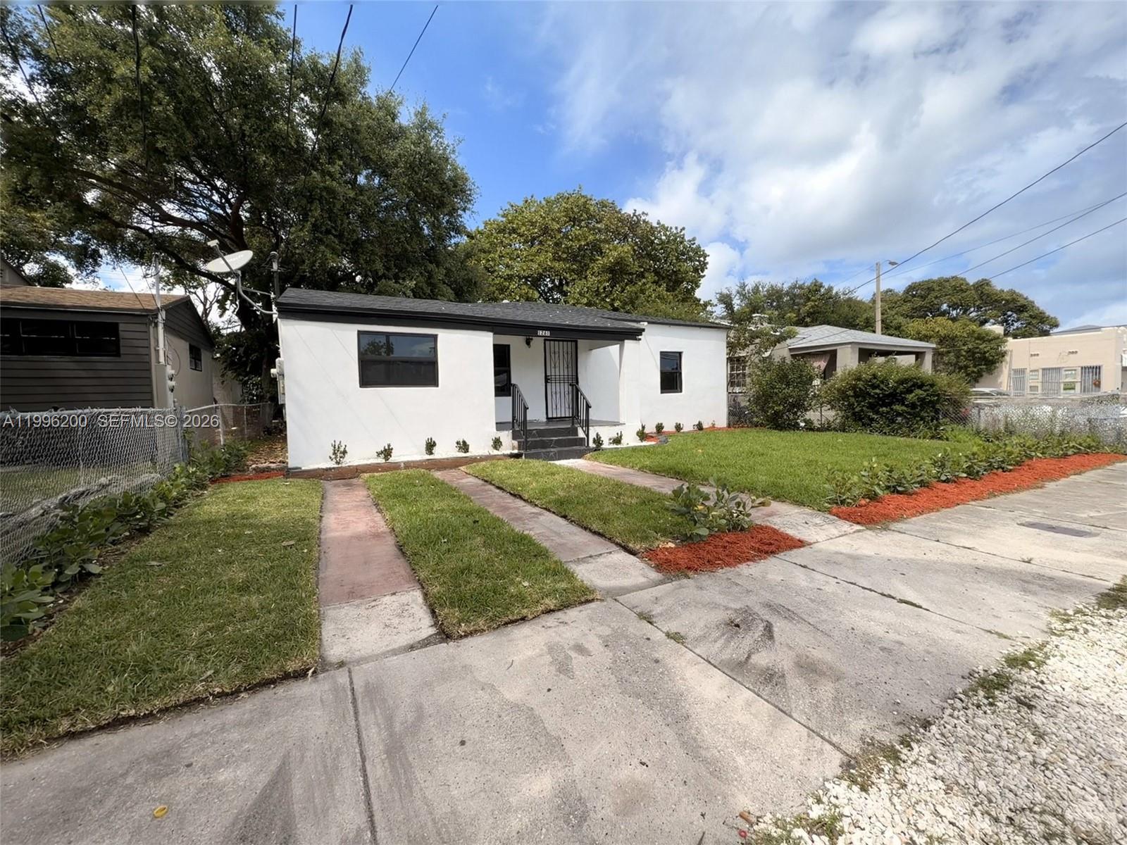 Completely remodeled 3-bedroom, 2-bathroom home with a versatile additional room—ideal as a Florida room, den, or home office—located in one of Miami’s fastest-growing and centrally positioned neighborhoods. This home has been fully upgraded from top to bottom, featuring a new roof, impact windows, and a brand-new HVAC system—offering long-term value and peace of mind. Inside, the open-concept layout is finished with oversized tile flooring throughout, creating a clean, modern flow perfect for both everyday living and entertaining.The kitchen is equipped with stainless steel appliances, including a refrigerator, stove, dishwasher, and micro-vent. The spacious primary suite includes a large walk-in closet and a beautifully designed ensuite bathroom with a walk-in shower and contemporary vanity. All bedrooms are generously sized, ideal for a growing family or flexible living arrangements.Location is everything—and this home delivers.Centrally located just minutes from Miami’s most in-demand areas, including Wynwood, Downtown Miami, Brickell, and Miami Design District. Enjoy quick access to major highways, making commuting and city living seamless.This area is experiencing strong redevelopment and appreciation, making it an excellent opportunity for both homeowners and investors looking to be near Miami’s urban core without paying premium prices.Move-in ready and competitively positioned—seller is offering assistance with closing costs.