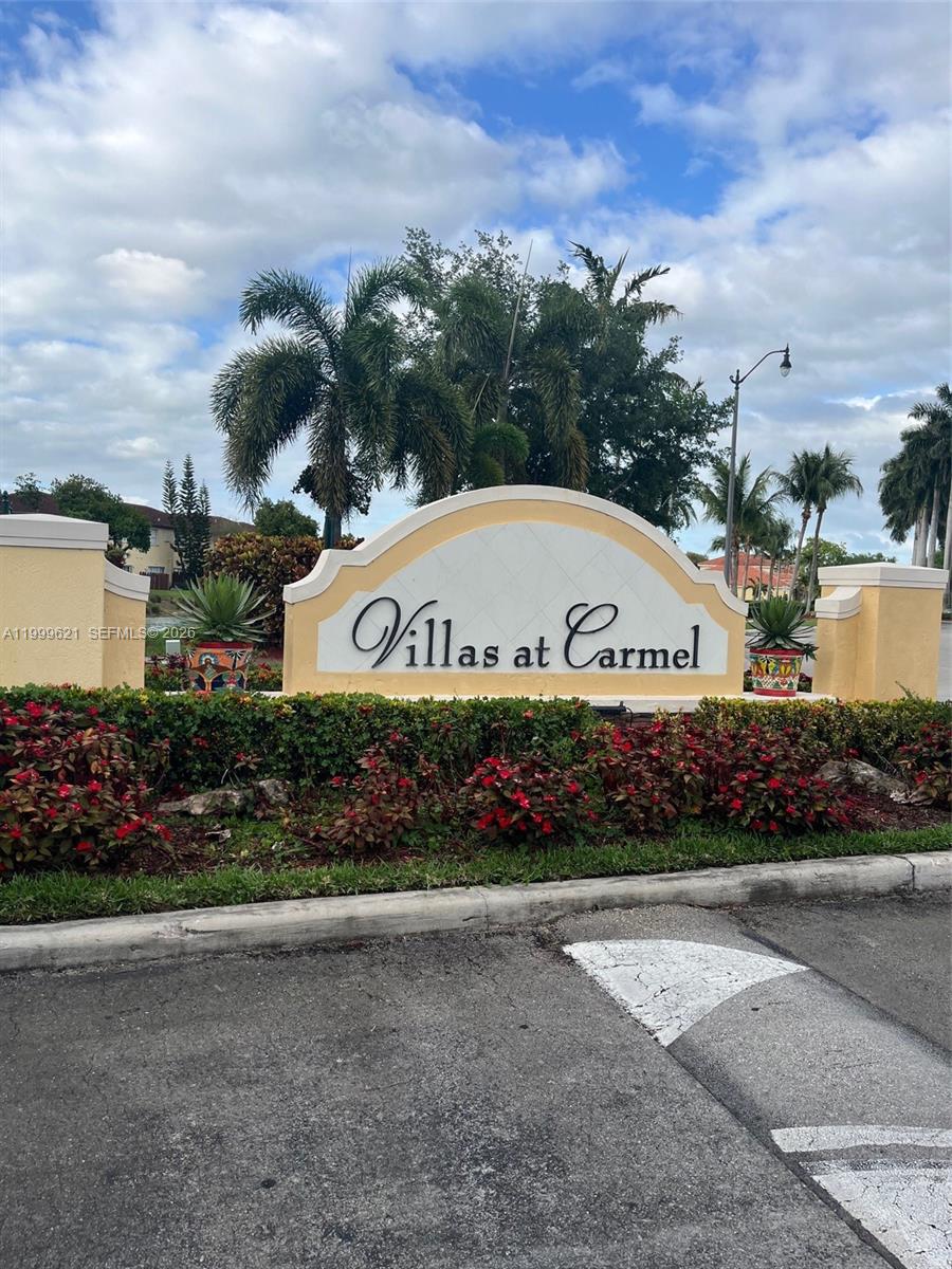 Beautiful first floor condo in the desired community of Villas at Carmel in Homestead.  Condo features 3 bedrooms, 2 baths, fenced in patio, stainless steel refrigerator, washer/dryer  inside unit, and storage room.  The community also has guard at the gate and offers great amenities which include a beautiful clubhouse, pool, exercise room, playground and picnic area.  Property is next to the Homestead Hospital and minutes from the Florida Turnpike .  It is also minutes from Homestead-Miami Speedway, restaurants and shopping centers.  A must see!!