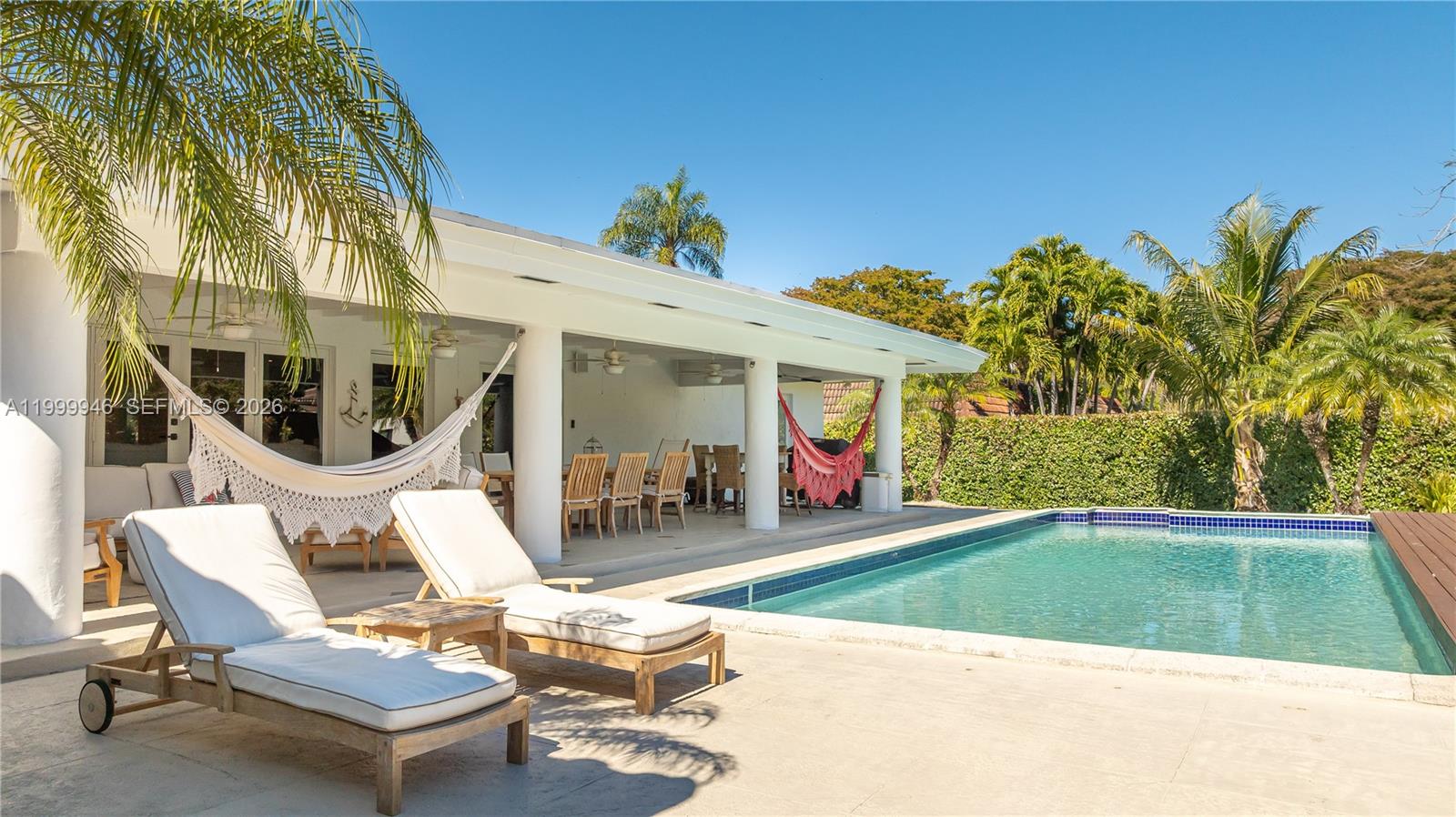 Impeccably updated 5/4.5+office on elevated lot in the gated community of Pinecrest By the Sea. Light & bright formal living & dining area, perfect for indoor/outdoor entertaining. Gourmet kitchen w/ Wolf & Sub zero appliances opens to large family room w/ vaulted ceilings lined w/ French doors that open to a large covered patio & sparkling pool.  Large master suite w/ spa like bath as well as 3 additional rooms, office and maids quarters. Perfect hometown enjoy the South Florida lifestyle. House can be rented furnished or unfurnished.