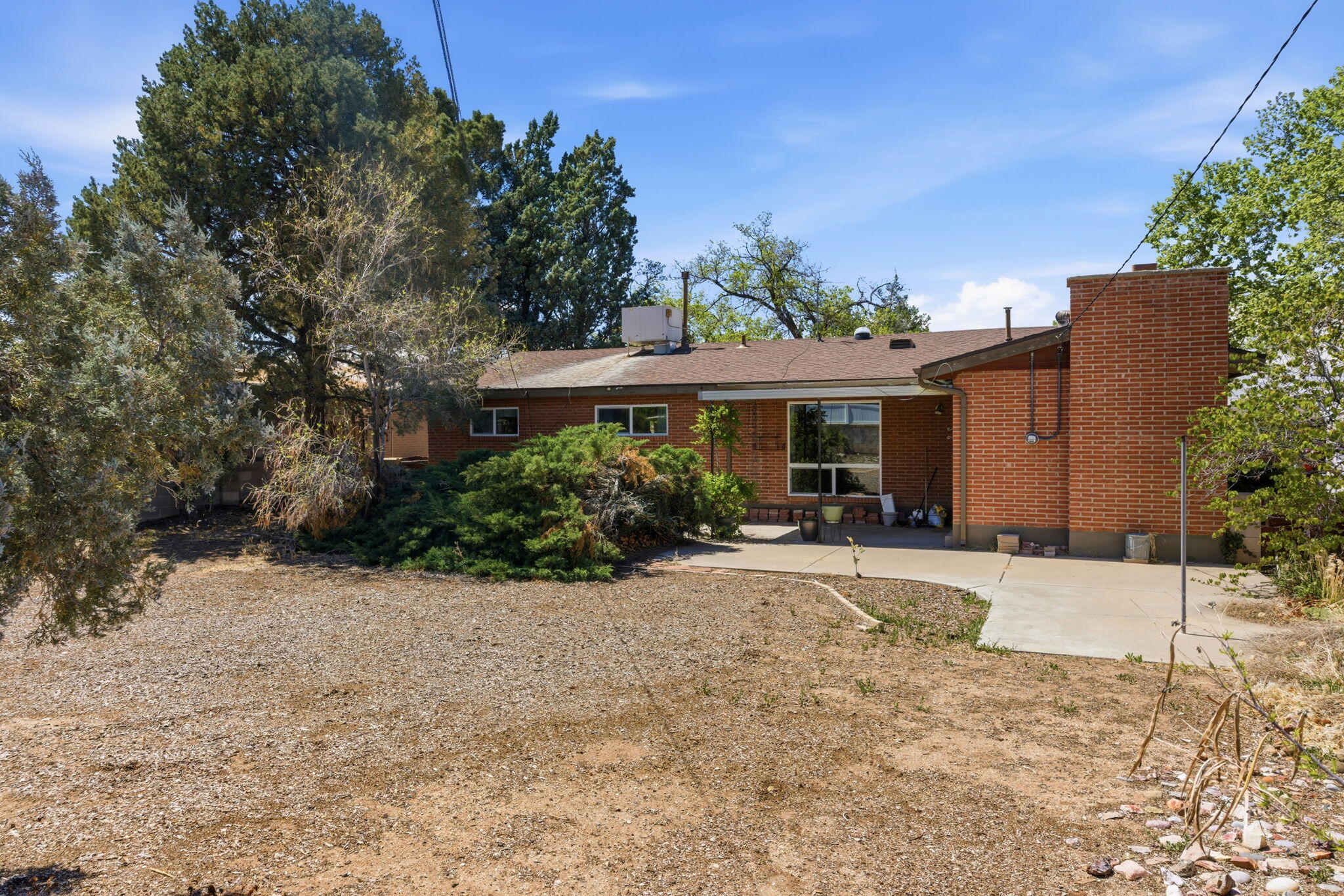 Charming 3 bedroom, 2 bath home, tastefully updated and centrally located. Light bright and open floorplan, granite counters, wood floors and lots of storage. Mature, low maintenance landscaping, large lot, covered patio. This home is move in ready!
