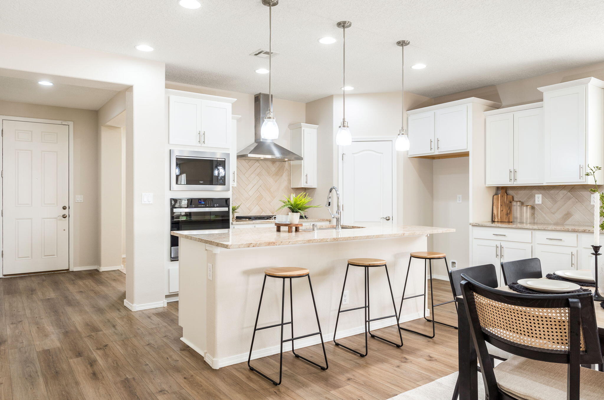 Welcome to this beautifully designed 4 bedroom, 2 bath Pulte built home featuring the popular Manzanita layout. The open concept design offers high ceilings, abundant natural light, and a spacious feel throughout. The kitchen includes stainless steel appliances, white cabinetry, ample counter space, and a long serving buffet, perfect for entertaining. The primary suite features a private bath and large closet, while three additional bedrooms offer flexibility. Enjoy a private backyard with a covered patio and raised garden bed. Upgrades include an epoxied garage and finished backyard. Conveniently located near parks, schools, hospitals, and shopping.