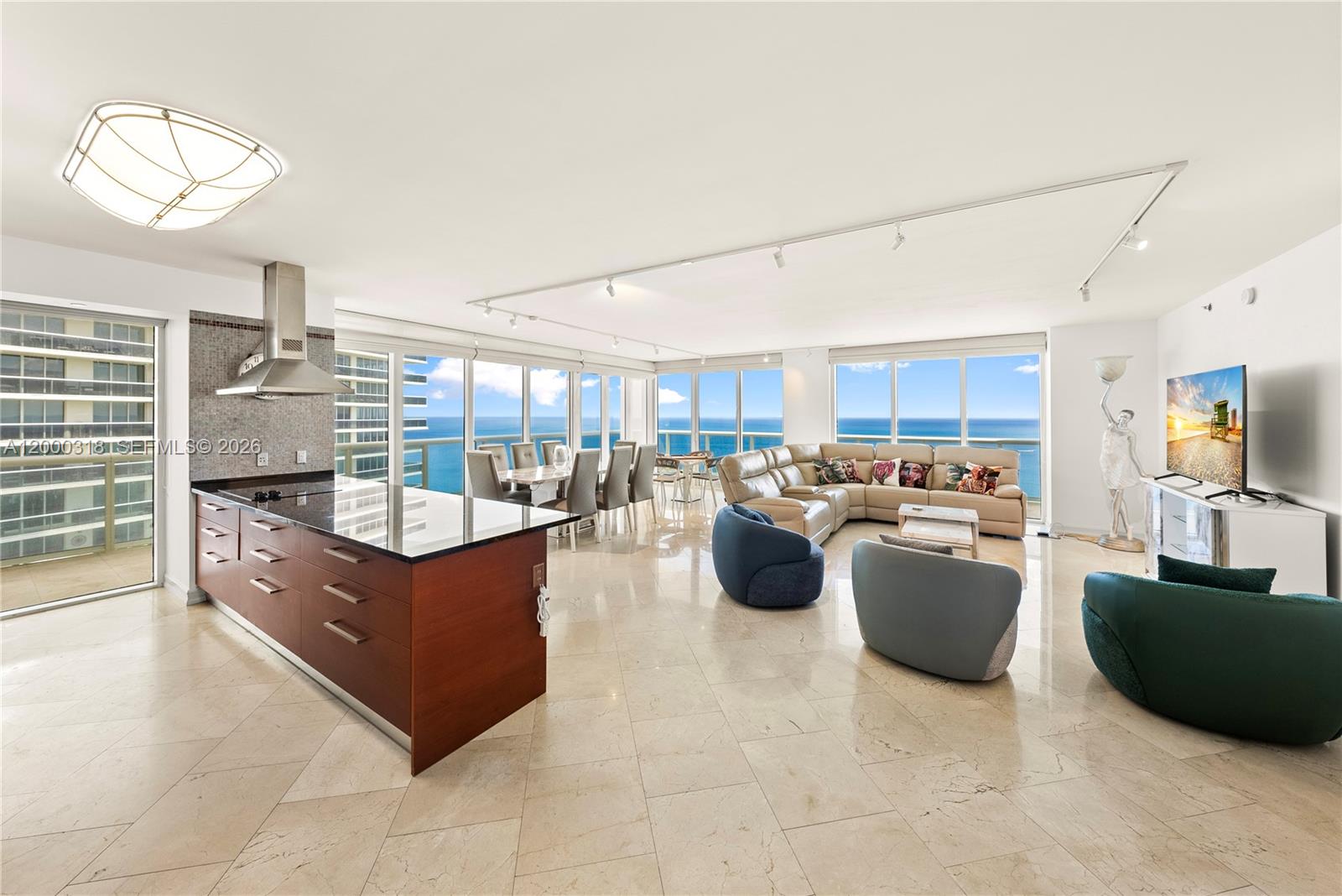 From the moment you walk in you will experience incredible breathtaking views of the ocean! This spacious residence features 3 bedrooms, 3.5 bathrooms with 2,078 interior SF and direct oceanfront views from every room, through the floor-to-ceiling glass sliding doors. Enjoy the magnificent 586 Sq.Ft. wrap-around balcony all year long. Other features include marble floors throughout, an open concept European-style kitchen with granite countertops, Kitchen Aid appliances and lots of storage cabinets. Live at the highly desirable Beach Club Tower 1. This oceanfront condominium features 5-Star resort style amenities, full-time concierge, and security, 24-hour valet, 5 warmed pools, and a 50,000 SF fitness center and spa.