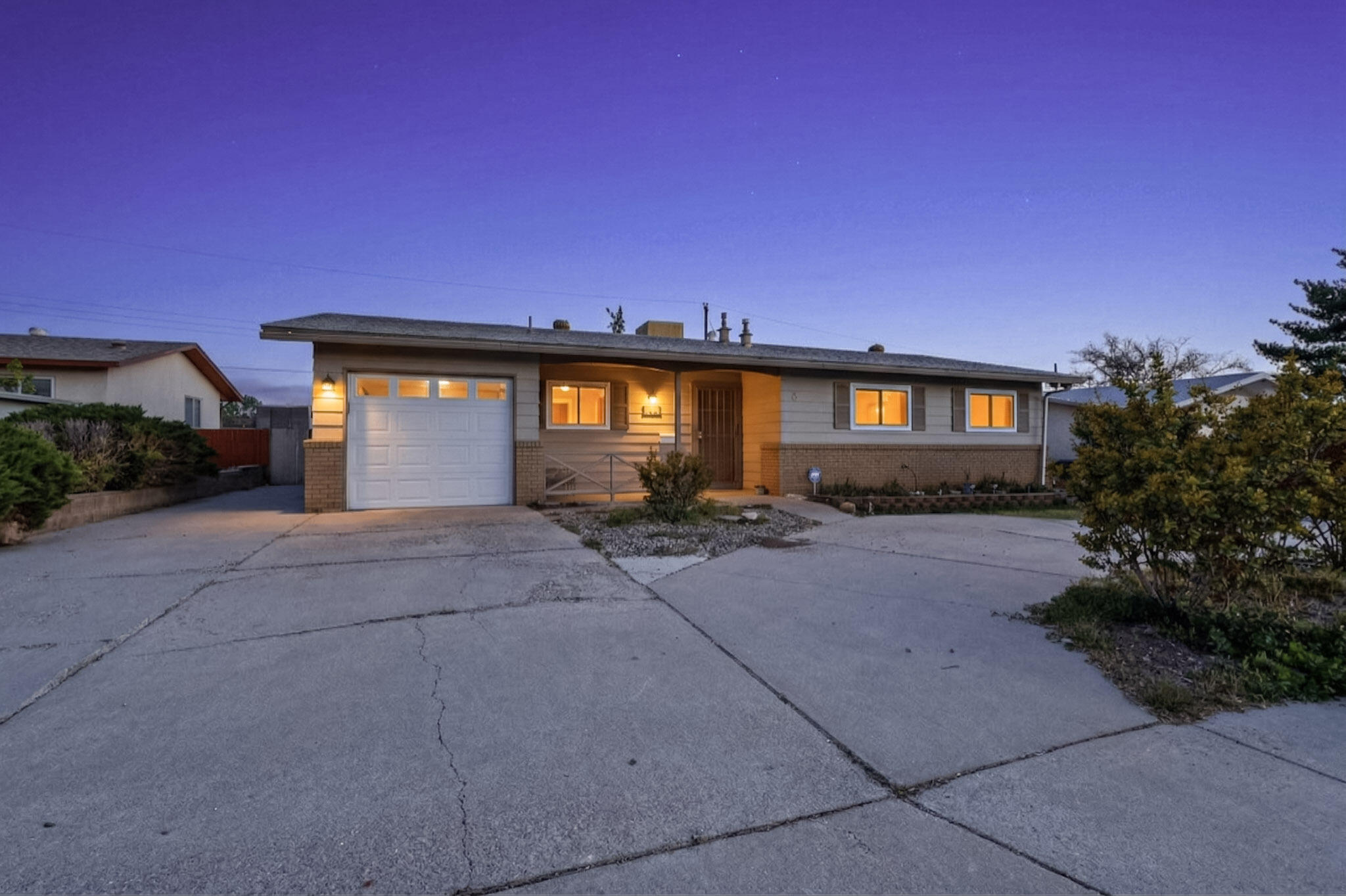 Step inside this inviting Northeast Albuquerque ranch, where natural light and warmth greet you the moment you walk through the door. The heart of the home unfolds into a spacious kitchen and dining area--perfect for everything from quiet mornings to lively gatherings-flowing seamlessly into two distinct living spaces designed for flexibility and comfort. The true standout? A stunning back living room wrapped in oversized windows, where the outdoors becomes part of your everyday experience. Picture cozy evenings by the pellet stove, sunlight pouring across the unique brick floors, and a space that instantly feels like your retreat from the world. Practicality meets charm with a garage, dedicated laundry room, and additional shed--giving you the storage you actually need! See this one today