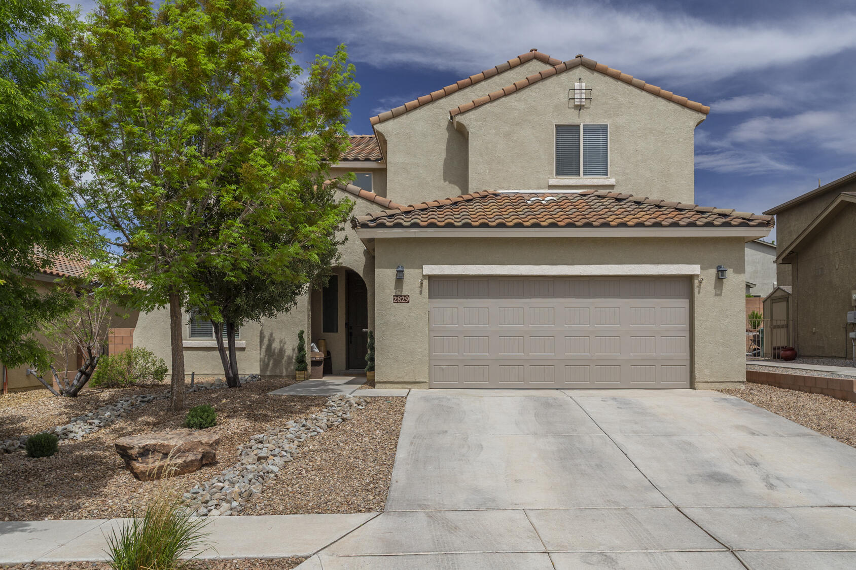 OPEN SATURDAY 4/18 1-3. Fall in love with this meticulously maintained home--fresh paint and new carpet make it feel brand new. The open floor plan centers on a bright living room with 20-ft ceilings, 18'' tile flooring, and a gas-log fireplace. The upgraded kitchen features granite countertops, stainless steel appliances, and cherry cabinets. and is open to the dining room. Enjoy main-suite convenience and a study on the first floor; upstairs offers three bedrooms, two baths, and a versatile loft. Outside, a newly re-landscaped backyard with expanded play and patio space and you'll enjoy the newer hot tub.  This private yard is low maintenance and perfect for all of your summertime FUN! BONUS: AMERICAN HOME SHIELD WARRANTY FOR BUYER!