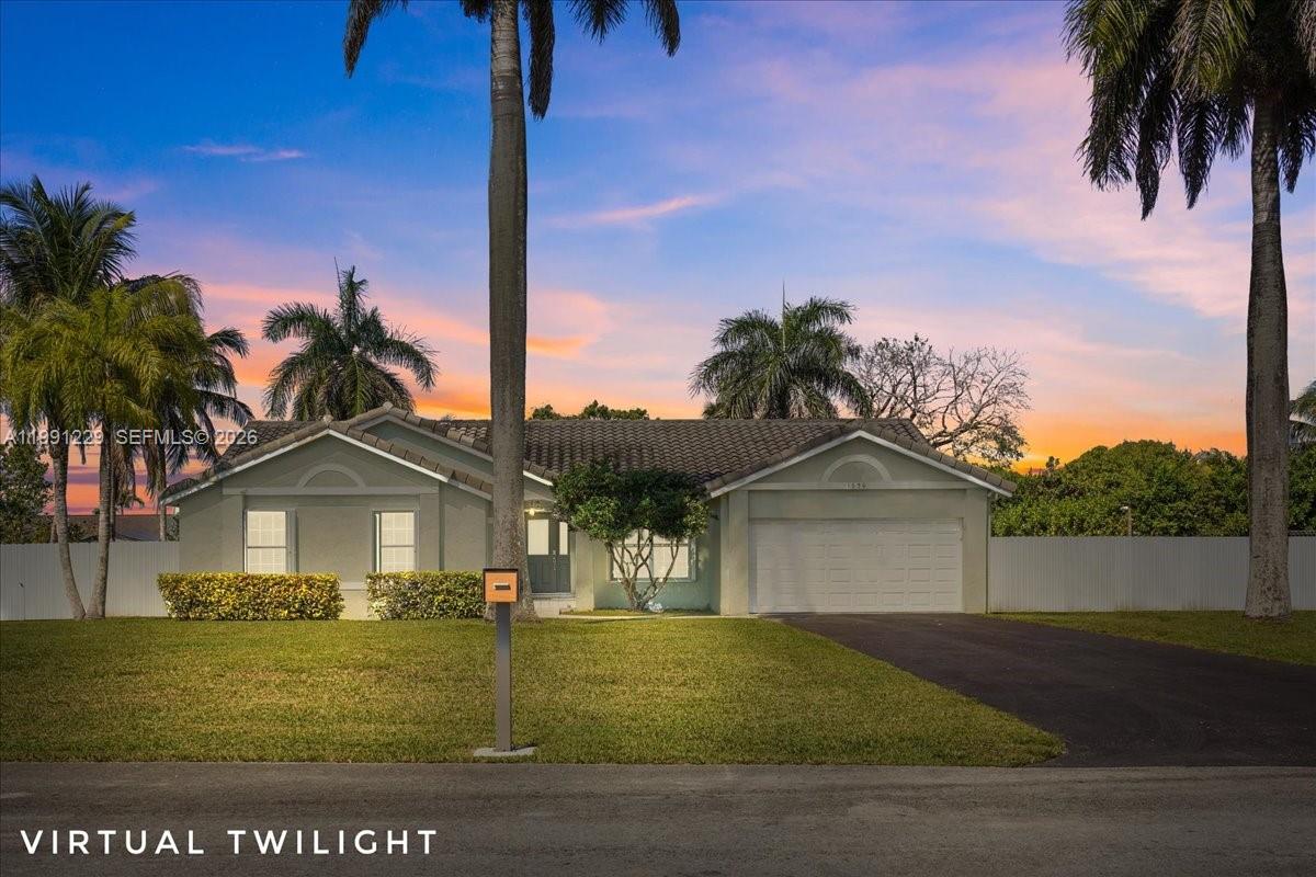 Discover this beautifully updated 4-bedroom, 2-bathroom home located in the highly sought after Redland area of Homestead.  Situated on a half acre lot, this fenced property offers privacy, space and NO HOA restrictions. Step inside to find a bright and open floor plan featuring high ceilings, lovely wood flooring, and an airy feel throughout.  The spacious white kitchen is equipped with stainless steel appliances and flows seamlessly into the dining area-perfect for everyday living and entertaining. Both bathrooms have been tastefully updated and are gorgeous! Other recent upgrades include a newer A/C, garage door, and impact resistant front doors.  The home is also equipped with a security system and Ring cameras.  Enjoy the expansive backyard with plenty of room for boats, RV's, and all your outdoor toys. Whether you envision hosting gatherings, creating your dream outdoor oasis, or adding a pool, the possibilities are endless! Conveniently located with easy access to Miami, this property offers the perfect balance of space, comfort, and accessibility.  A rare opportunity to enjoy peaceful living with plenty of green space.