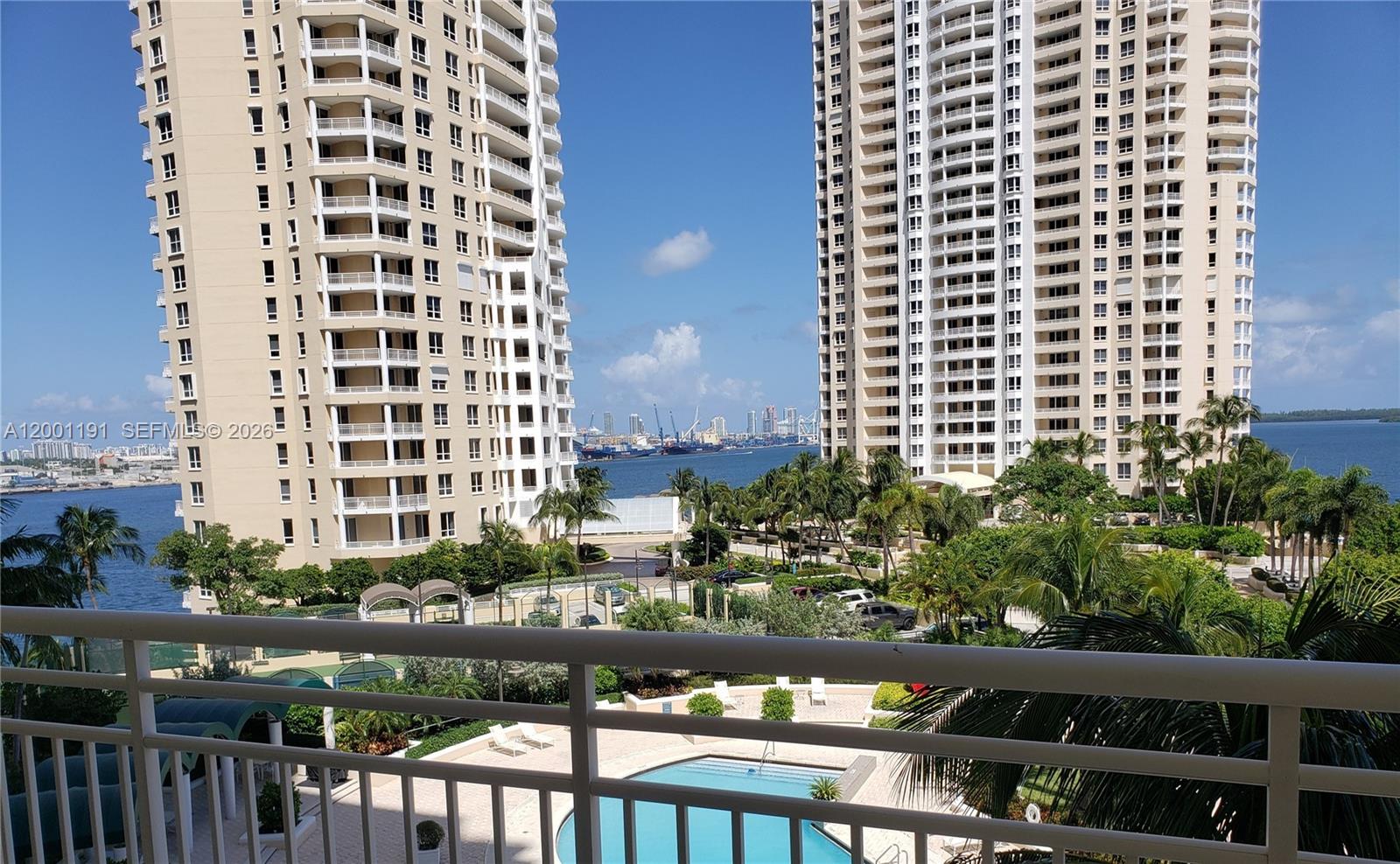 Step into comfort & luxury with this lovely 1BD/1.5BA waterfront unit at ONE TEQUESTA POINTE on BRICKELL KEY. Revel in beautiful Southeast Direct Water views, as Miami's tropical breezes & the vibrant Biscayne Bay animate your daily surroundings. Enjoy relaxing moments from its covered balcony perfect for savoring morning coffee or catching the sunrise. Inside, a thoughtfully designed layout offers generous living & kitchen areas, in-unit Washer/Dryer, a guest half-bathroom, Marble floors, and a serene retreat en-suite bedroom creating a perfect oasis in the heart of the city. Marble floors reflect natural light and enhance the sense of sophistication.