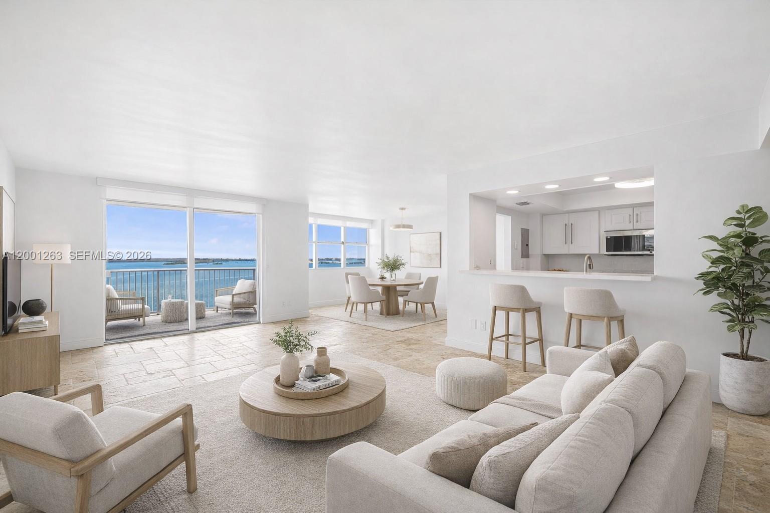 Rare opportunity to own one of the most desirable corner lines in the building. This 3-bedroom, 2-bath residence sits on the 14th floor and delivers unobstructed 180° views of Biscayne Bay, with water visible from every room.The layout is efficient and clean, with natural light throughout and a true sense of openness that is difficult to replicate in this price range. The unit has been substantially renovated, featuring updated flooring, a modern kitchen, and a well-distributed living space that maximizes both functionality and views.The primary suite includes a walk-in closet and a fully upgraded en-suite bathroom. Secondary bedrooms are properly sized, each with built-in storage and direct water views, which is uncommon in comparable units.Includes two assigned parking spaces and a private storage unit, both considered premium assets in Brickell. The building is completing its 50-year certification, with amenities scheduled to be fully operational shortly.No washer and dryer inside the unit. Laundry room available on every floor.