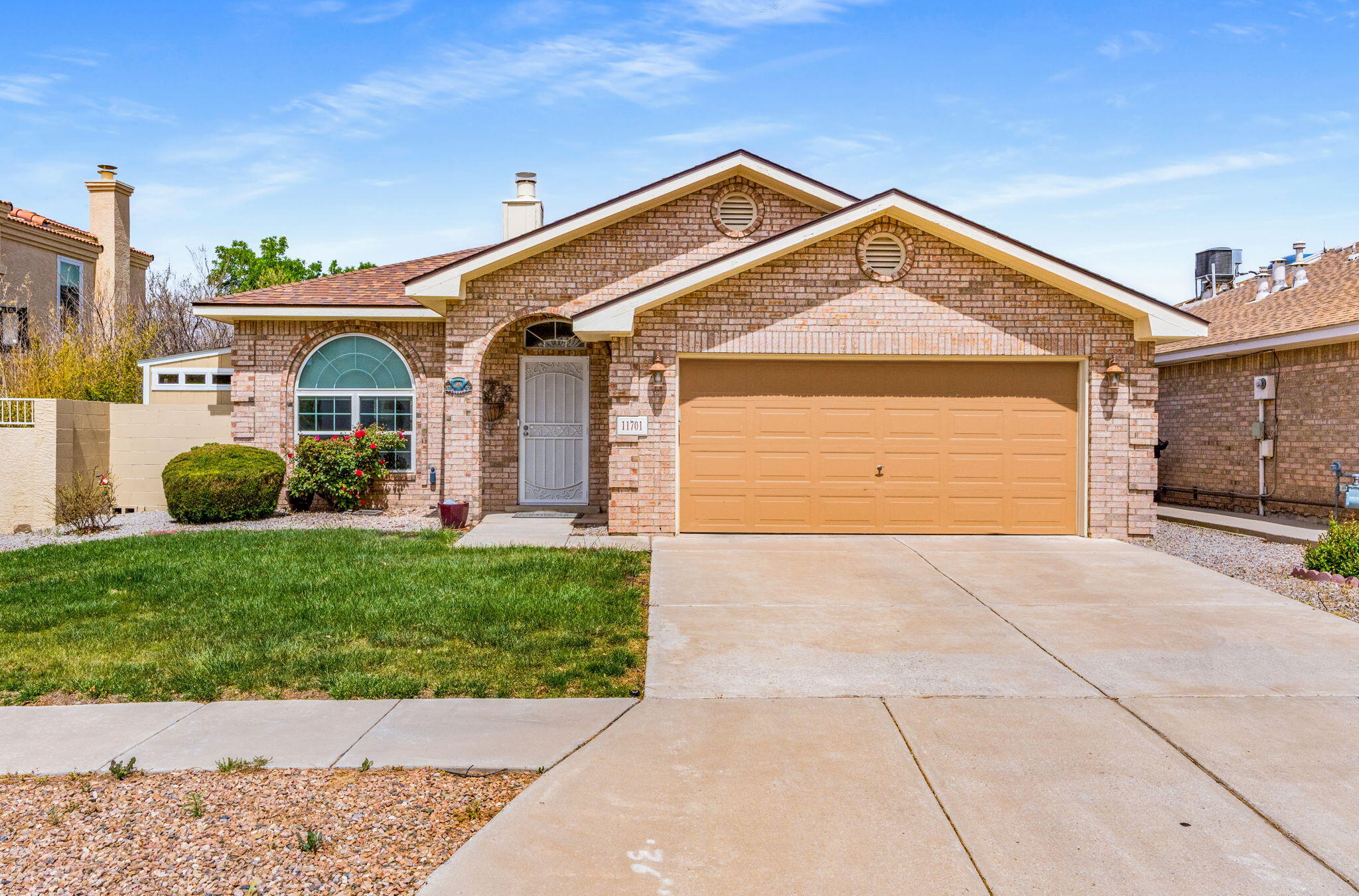 Welcome home to this beautifully maintained single-story gem in desirable Willow Wood featuring a newer roof and refrigerated air! Designed for comfort and easy living, this home offers soaring vaulted ceilings, abundant natural light, and a warm open floor plan perfect for everyday living and entertaining. The spacious kitchen features granite countertops, stainless steel appliances, and opens seamlessly to the dining area with direct access to the covered patio. Enjoy a private terraced backyard with low-maintenance landscaping ideal for relaxing evenings outdoors. The generous primary suite offers vaulted ceilings and a private ensuite bath.  2-car garage with extra storage. Prime location near Kirtland AFB, Sandia Labs, airport, I-40, Tramway, shopping, and parks.