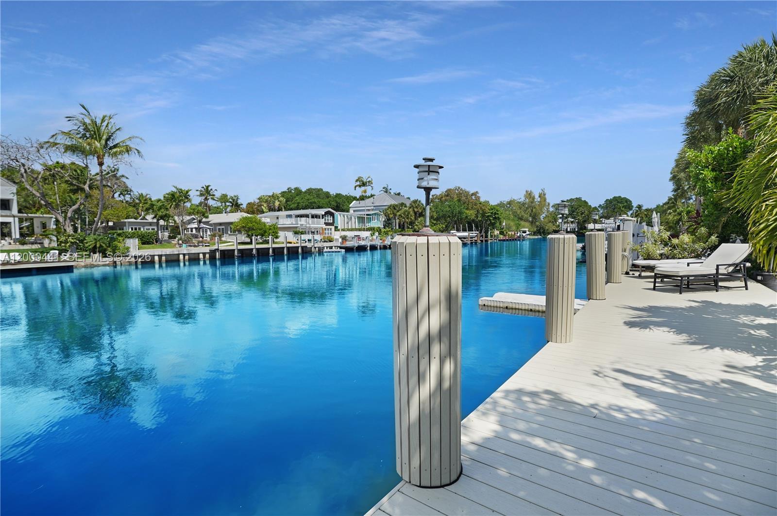 Have you ever walked into a home and said "Wow, this is special!"? You're certain to do so when you tour this remodelled waterfont pool home in the coveted Las Olas Isles. You'll be impressed with the lovely landscaping; the refreshing pool; the 52 feet of deep water, ocean access waterfront on a 150+ foot wide canal (dock & seawall recently raised). And wait until you see inside! The oh-so-soft mediterranean touches outside give way to an incredibly thoughtful transitional style inside delightfully mixing warm, original character with stylish, modern fiinshes. Inside you'll be greeted by polished marble floors, French doors, built-in shelving, multiple areas for relaxation and entertaining, & room-sized alcoves perfect for a home office, library & cozy TV viewing. AND an upgraded kitchen with Sub-Zero & Bosch appliances all wrapped with classic white cabinetry & granite counters & backsplashes. Windows, windows & more windows frame the pool & patio view. Step outside to a marvelous, oversized covered patio with diagonally set ceramic tile that compliments the interior marble & the seemingly endless brick pavers that gift-wrap the pool and weave around the home to form an inviting side patio & circular driveway. Offering 3 bedrooms with TWO primary en suite bedrooms (1st floor & upstairs with Juliette balcony) & third bedroom currently used as a theatre room, with three full baths, closet buit-ins & outdoor shower. Seller has guests in town. Showings begin Sun., March 19th.