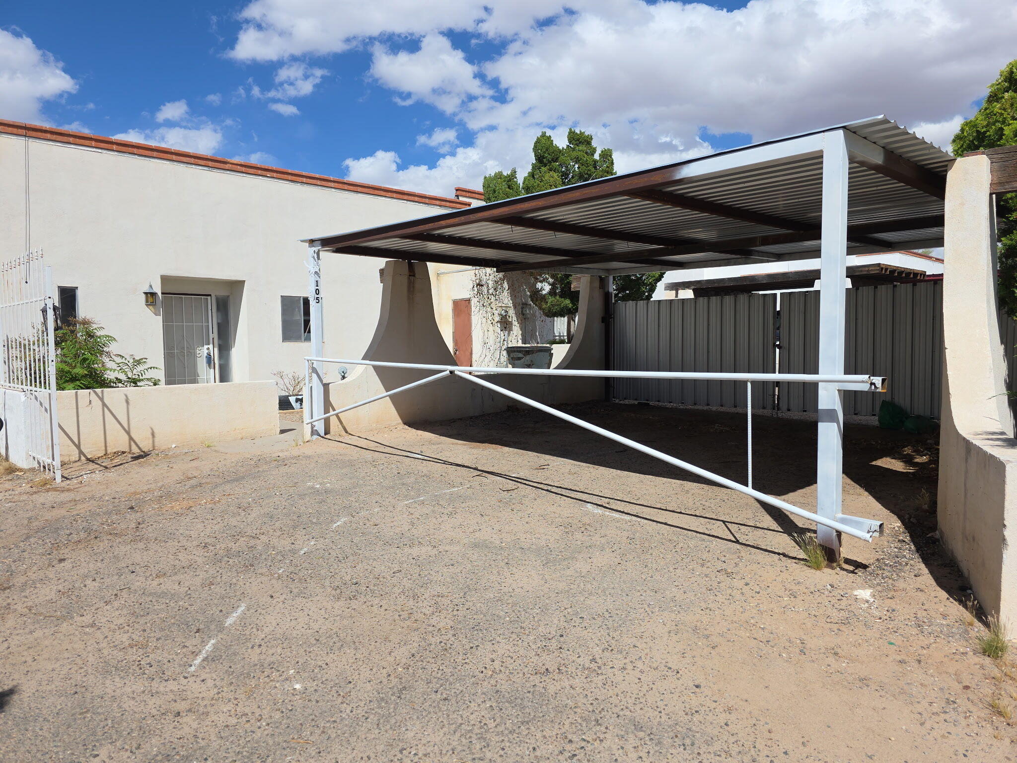 Charming and versatile 1-bedroom, 1-bath townhome featuring a spacious unheated bonus room. Brand new interior paint and water heater. Also, enjoy parking your cars under the new metal carport.  Lots of space to make it your own cozy oasis. Schedule your showing today!