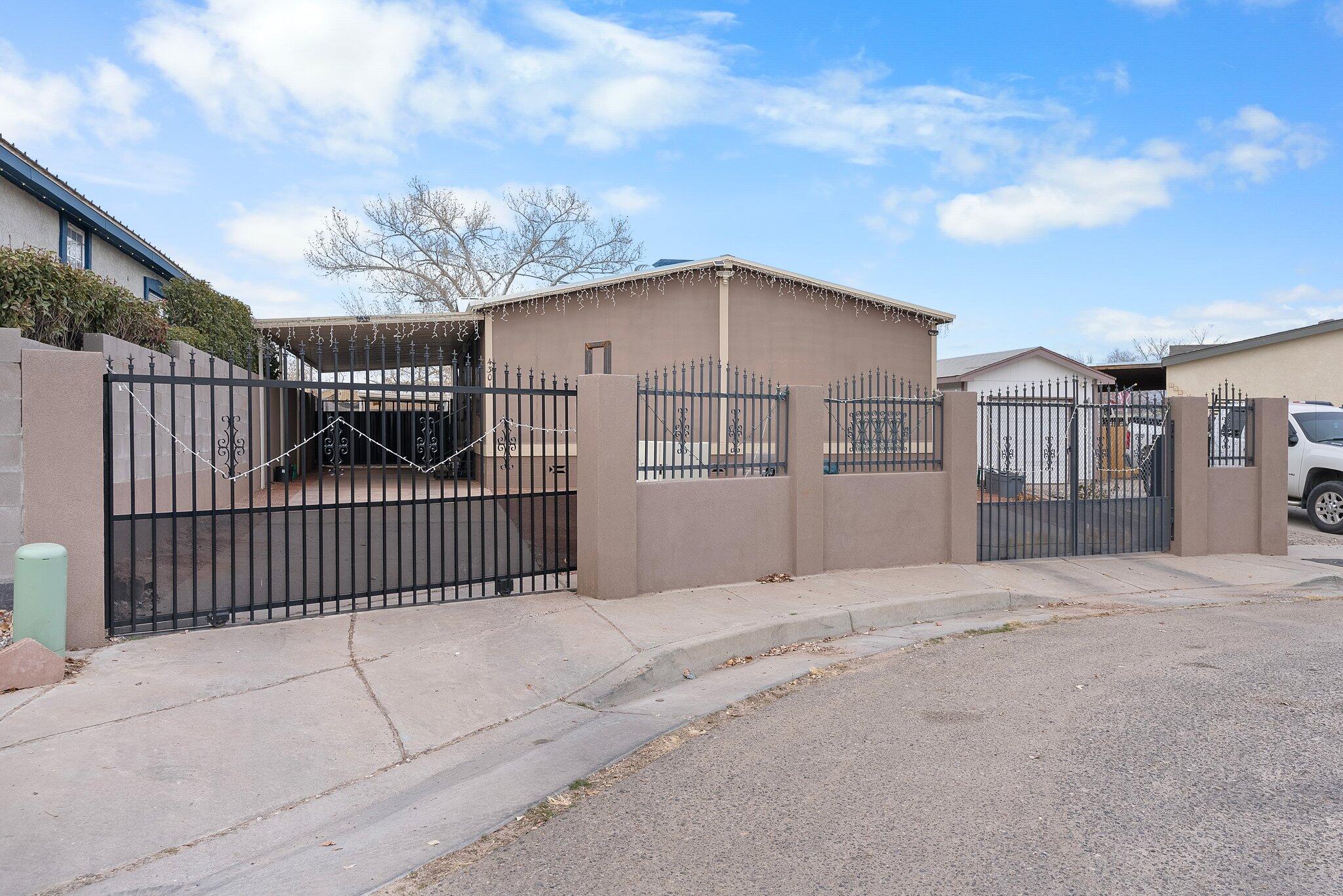Beautiful property in the South Valley. The house features 3 bedrooms, 2 bathrooms, a spacious kitchen, gate, and fencing all Around. It also includes a carport and backyard.  Submit your offers!
