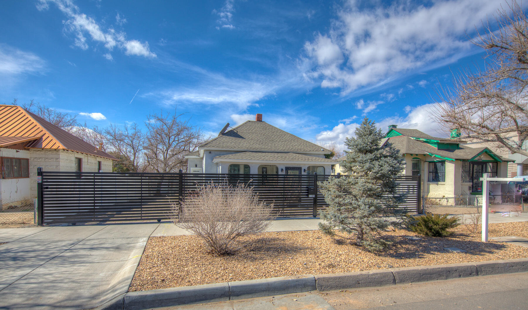 Beautiful single story home in Downtown Albuquerque. this charming 2 bedroom 1 bath home with original hardwood floors is open light and bright.Seller has recently added tankless water heater, central / Refrigerated A/C. new windows and doors, new appliances, granite counter tops are just some of the updates. Livingroom is full of light and opens to large dining room. A bonus space not included in Sq footage is the full size attic perfect for office studio or tons of storage. The home additionally has back yard access with additional access thru ally. A large detached storage or studio is another bonus. The home is warm and inviting and a must see.