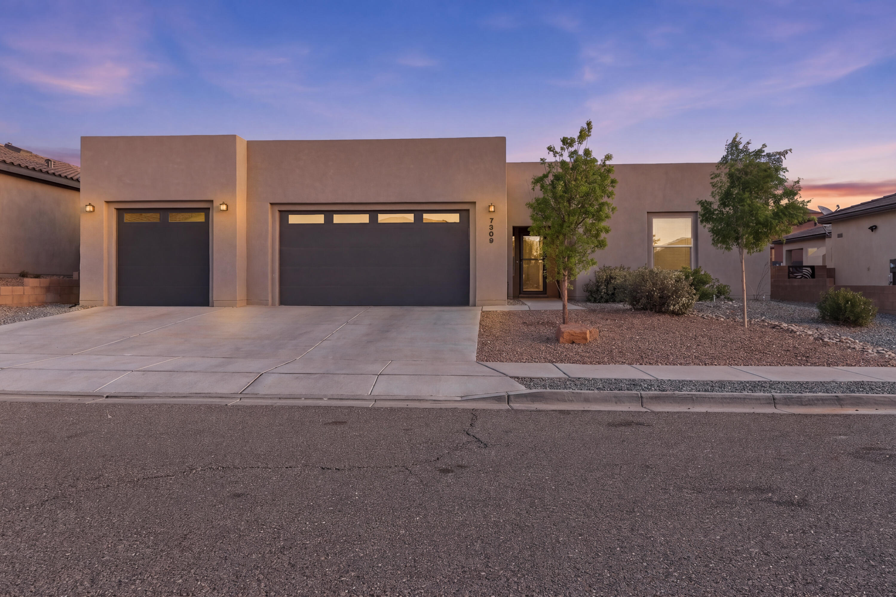 ***OPEN HOUSE Sat 4/18 12-2pm - if still available*** Gorgeous turn key residence to knock your socks off! A delightfully rare find, you'll be electrified with excitement the moment you cross the threshold! This upscale Raylee custom is loaded with special features including: durable synthetic stucco, extra-tall garage doors with windows for high-clearance vehicles, energy-saving vinyl thermal windows, tankless H20 heater, cozy refrigerated air for hot summer days, durable wood-look tile everywhere except comfy bedrooms, stylish easy-care gas fireplace with modern mantle finish, 5 spacious bedrooms + separate office, walk-in closets for ample storage, extra-large shaded covered patio for outdoor living, and a big thoughtfully-landscaped backyard featuring tiers to maximize mountain views.