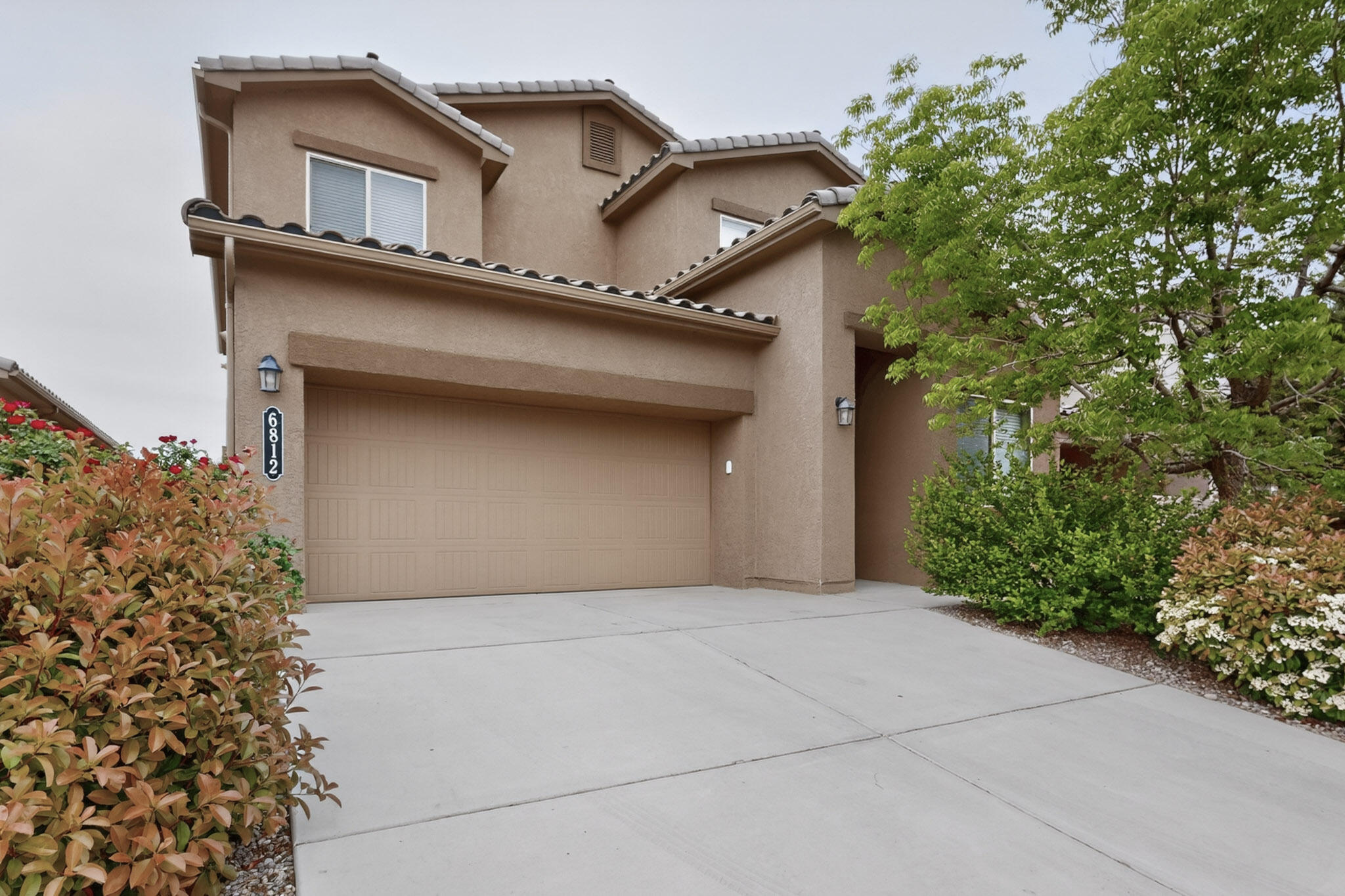 Welcome to this beautifully maintained Northwest Albuquerque home featuring a layout that truly stands out! The primary bedroom is conveniently located downstairs, offering comfort, privacy, and ease of everyday living--perfect for those seeking main-level convenience. Upstairs, you'll find a spacious second bedroom complete with its own full bathroom, ideal for guests, multigenerational living, or a private home office retreat. This thoughtful separation of space adds versatility and function to fit a variety of lifestyles. The home offers bright, inviting living areas and a comfortable flow for both relaxing and entertaining. Conveniently located near shopping, dining, and major roadways, this home combines practicality, flexibility, and charm--don't miss this fantastic opportunity!
