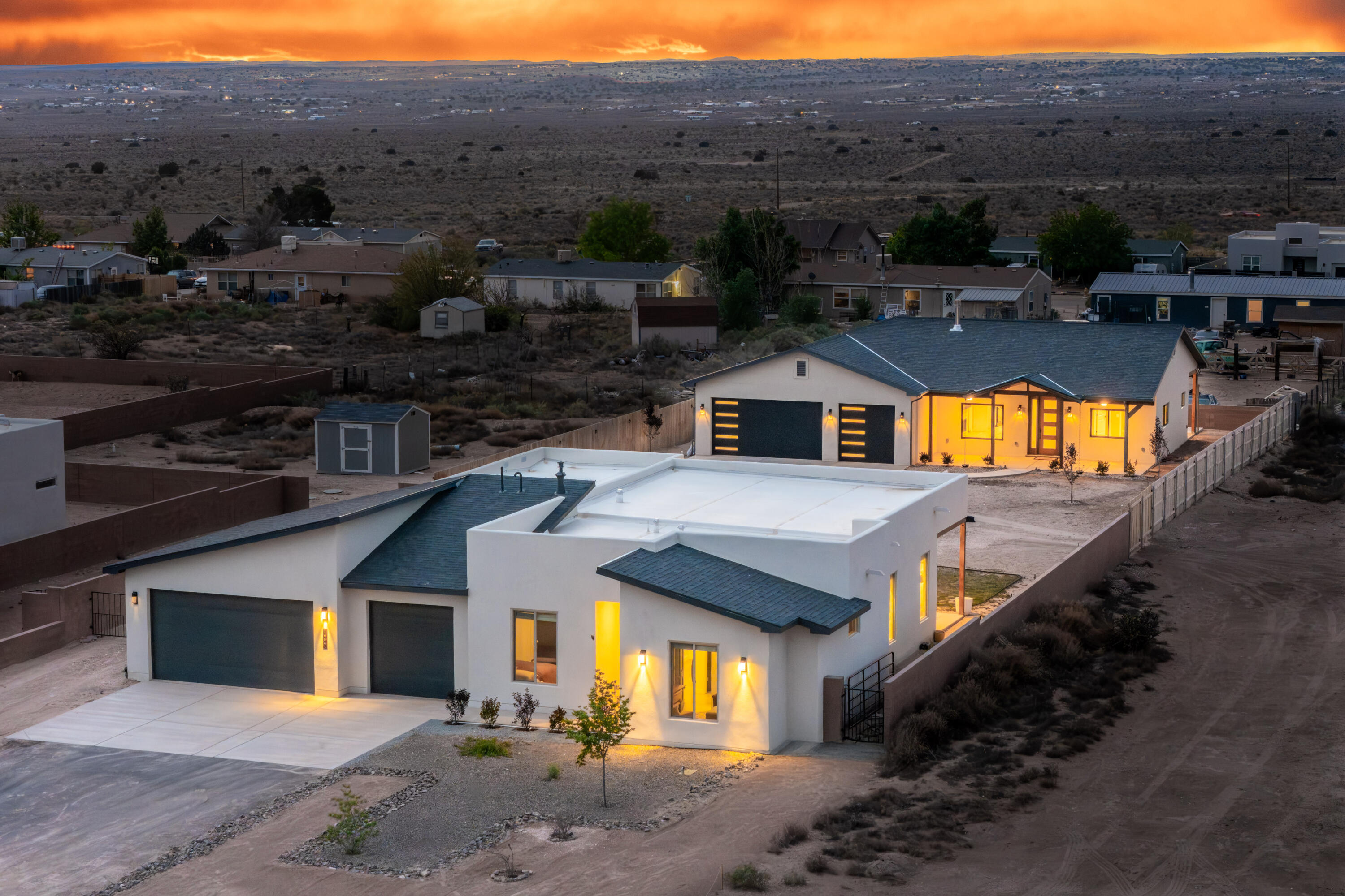 Why buy one house when you can buy two, plus have room to garage up to 8 cars on one generous 1/2 acre lot with no HOA or PID? The Main Home, with a 3 car garage, was finished in late 2024, and not occupied until 2025. It offers a bright, open layout with polished concrete flooring throughout for a sleek, low-maintenance finish. The kitchen is designed for everyday living AND entertaining - with solid wood cabinetry, gas range, large pantry, and abundant storage. The primary suite is spacious and there are 3 separate additional bedrooms to customize the way you live. The Casita is brand new, never lived in, and the garage has room for 5 cars, or 3 and a workshop, gym, or just ROOM, and boasts a bathroom fit for a Primary Suite! Designed and built for the current owners, a life change means