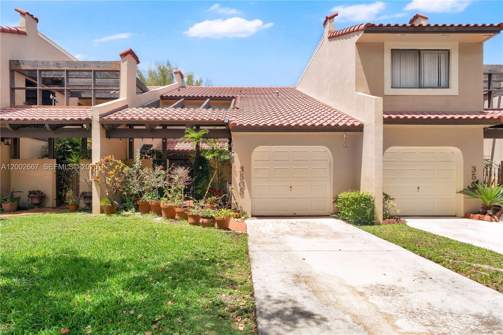 Open-concept living area at 3505 Torremolinos Ave - Townhouse in Doral