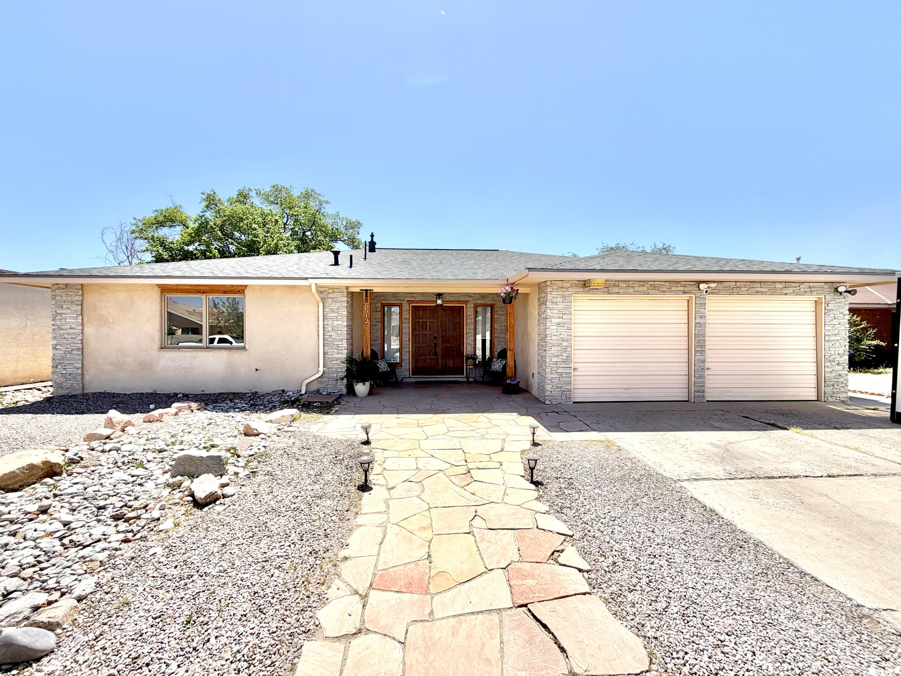 Welcome to your next home in desirable Taylor Ranch! Step inside to a fully updated interior featuring modern finishes, upgraded flooring, and refined details that elevate everyday living. Enjoy peace of mind with a new roof installed in July 2025. This home showcases thoughtful design and custom craftsmanship throughout. The kitchen is a chef's dream with custom cabinetry, marbled concrete countertops, and granite inlay. Relax in spa-inspired bathrooms with natural Austrian stone showers, counters, and heated floors. Outside, a private backyard oasis awaits with lush grass and a spacious covered patio, perfect for entertaining or unwinding. Move-in ready and beautifully maintained, this home is ready for its next owner! Enjoy nearby parks, trails, shopping, and dining just minutes away