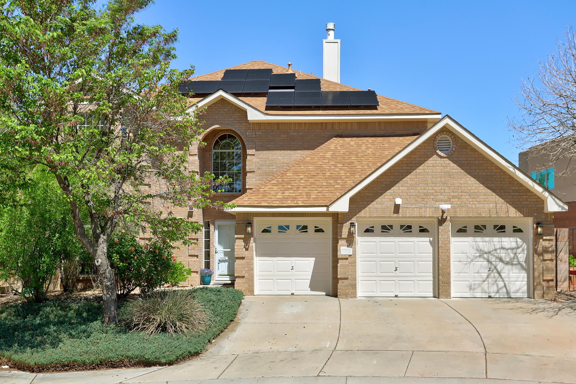 Tucked at the end of a quiet cul-de-sac, this Quintessence dream home blends charm, comfort & location near park & trail. Lovingly maintained by original owners, it features 2026 updates including wood-plank LVT flooring, fresh paint throughout, stylish lighting & updated bath fixtures. The chef's kitchen shines w/newly installed SS appliances, abundant cabinetry, a mixer pullout & island complete w/its own wood cutting board. The owner's suite offers a private deck w/mountain views. Enjoy your backyard oasis w/a sparkling pool perfect for those warm NM days, fruit from your own cherry tree, gorgeous smelling roses & private pergola. The 3-car garage w/storage, water softener & solar for lower utility costs complete this fabulous home.