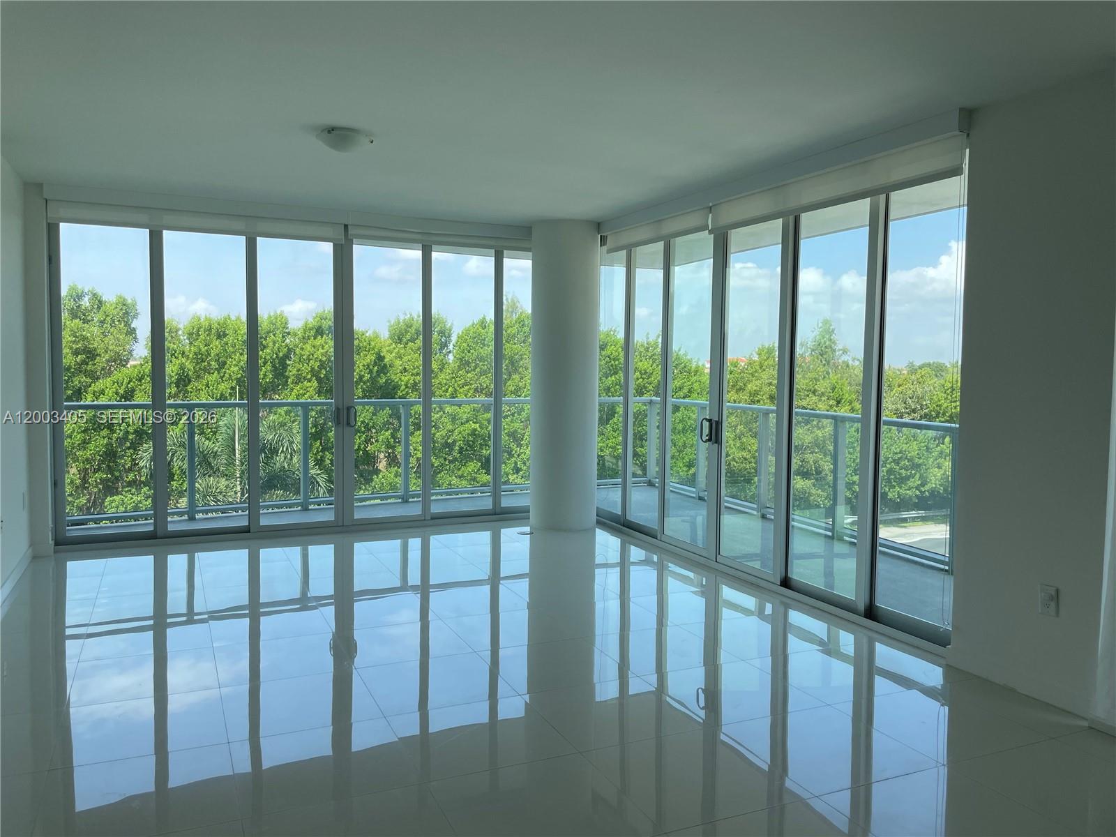 HOT NEW LISTING: Rare opportunity to own the largest 3-bedroom + DEN layout in Doral. This expansive residence offers 3 full baths + powder room and 1,906 SQ FT under AC, with a versatile DEN easily convertible into a 4th bedroom. Designed for modern living, it features an open gourmet kitchen with Italian cabinetry, Bosch stainless steel appliances, smart home technology, and an oversized quartz island perfect for entertaining. Bright, open living and dining areas flow through telescopic impact glass doors into a huge wraparound balcony.Premium finishes include porcelain floors, roller blinds, sleek bathrooms with frameless glass showers, upgraded washer/dryer, and generous closet space. Enjoy 2 assigned covered parking spaces, plus guest parking, and a large private storage cage conveniently located just steps from your door. Prime location near top schools, shopping, dining, and major highways. Tenant-occupied—advance notice required.