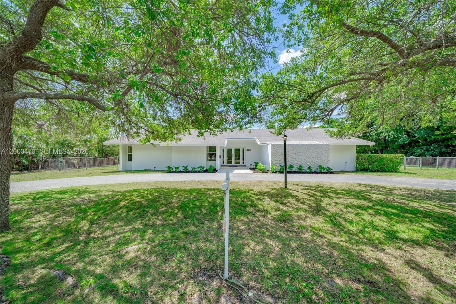 Located in the highly sought-after Village of Pinecrest, 13100 SW 81st Ave presents a rare opportunity to secure a spacious property in one of Miami’s most prestigious residential communities.Surrounded by lush landscaping and mature trees, this residence offers a private and serene setting with exceptional potential to personalize, renovate, or create your dream estate. The home has been freshly painted inside and out, delivering a clean, move-in-ready canvas. Recent upgrades include updated flooring, a renovated cabana bathroom, new stove, gas heater and dryer, full impact windows and doors, and a 2025 AC unit.Designed with an open-concept layout, the home features expansive living areas filled with natural light, creating a seamless flow ideal for both everyday living and entertaining.The oversized lot provides ample space to design a custom outdoor oasis, expanding living areas, or enhancing landscaping, making it highly appealing for both end users and investors.Ideally located near top-rated schools including Palmetto Senior High, as well as premier dining, shopping, and major roadways, this property offers a perfect balance of privacy, convenience, and long-term value.Properties offering this combination of location, condition, and potential in Pinecrest are increasingly rare.Immediate showings available. This is a limited opportunity.