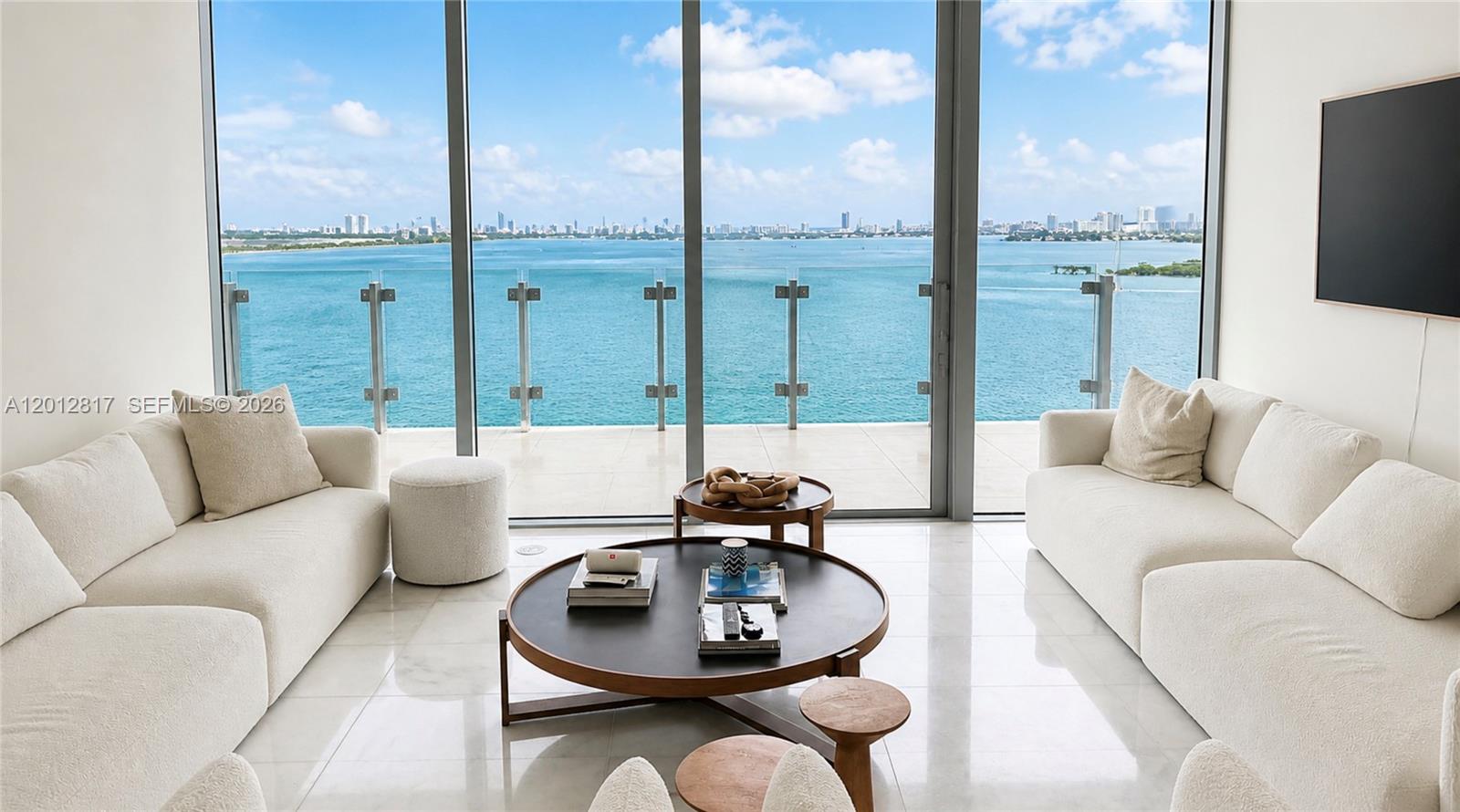 Wake up above the water, where sunrise fills the residence and endless views stretch across Biscayne Bay to the ocean. From your private elevator entry, this unit feels completely removed from Miami’s fast pace with no neighboring buildings in sight, just open water, tropical islands, ocean and horizon views in every direction. The living room and primary bedrooms face the bay with en-suite baths, delivering natural light, wide sightlines, and a constant connection to the water. Watch cruise ships depart the port, boats pass throughout the day, and experience true waterfront living. A well-designed split-bedroom layout offers both privacy and flexibility. The enclosed den currently serves as a third bedroom with its own full bath and closet, ideal as a private suite or adaptable living space. Configured as 3 bedrooms and 3.5 baths, the residence also includes a spacious laundry room, generous closet space, and a private elevator foyer. Clean, modern interiors complement the uninterrupted views, creating a rare and highly desirable offering. Residents of Missoni Baia enjoy resort-style amenities including tennis and pickleball courts, two bayfront pools with an Olympic-size pool, spa with sauna and steam rooms, waterfront fitness center, yoga and Pilates studio, lounge, game room, theater, children’s playroom, outdoor cabanas and BBQ areas, pet spa, beauty salon, plus 24-hour concierge and valet.