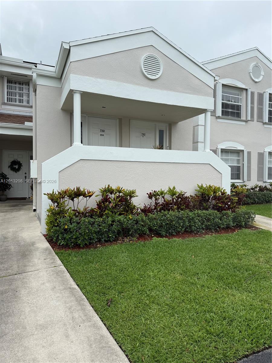 This immaculate second floor condo in Centergate community features two spacious bedrooms and baths, it boasts an open, airy layout complemented by beautiful laminate floors throughout.  the kitchen is updated while the dedicated laundry room adds an extra touch of functionality. Step onto the screened balcony, perfect for relaxing with morning coffee or enjoying evening breezes.  Rent covers A T&T cable & internet, water, garbage, pest control, 24 roving security with gated entrance and clubhouse with pool, tennis and pickleball courts. This condo is in exellent condition and ready for you to move in!  Don't miss out!  refrigerator will be installed prior to move in.