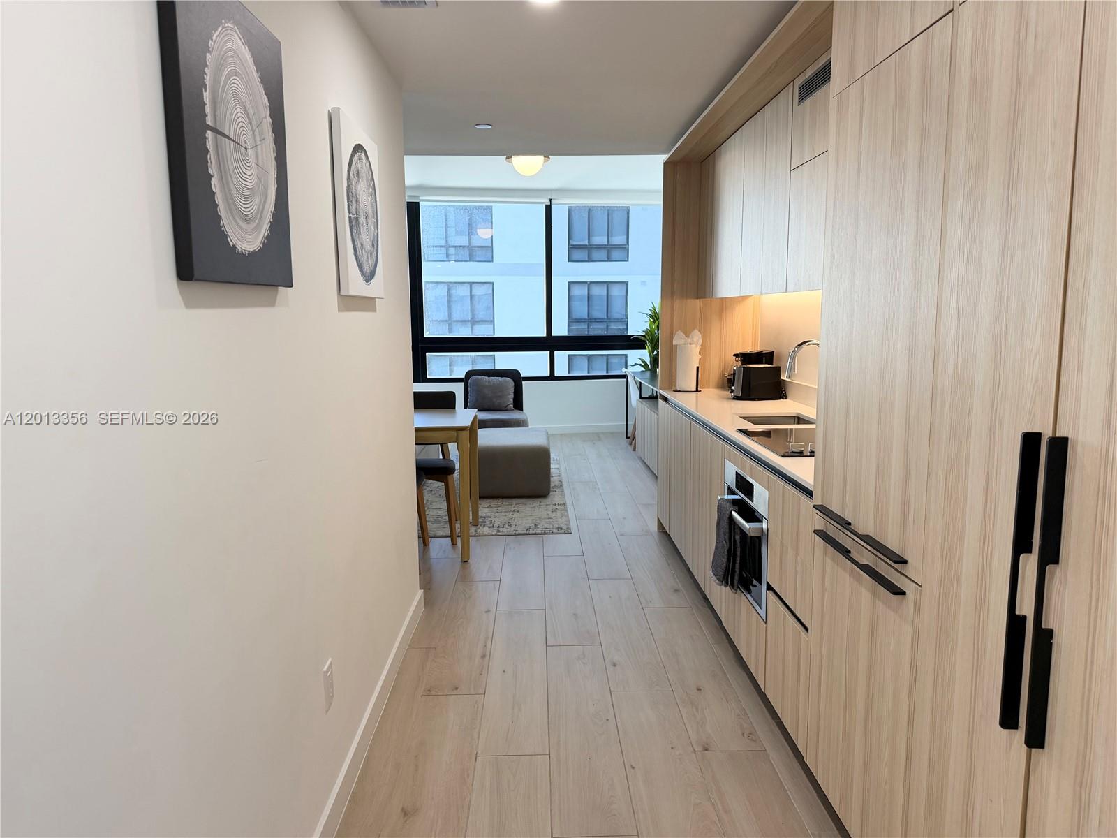 District 225 Condo