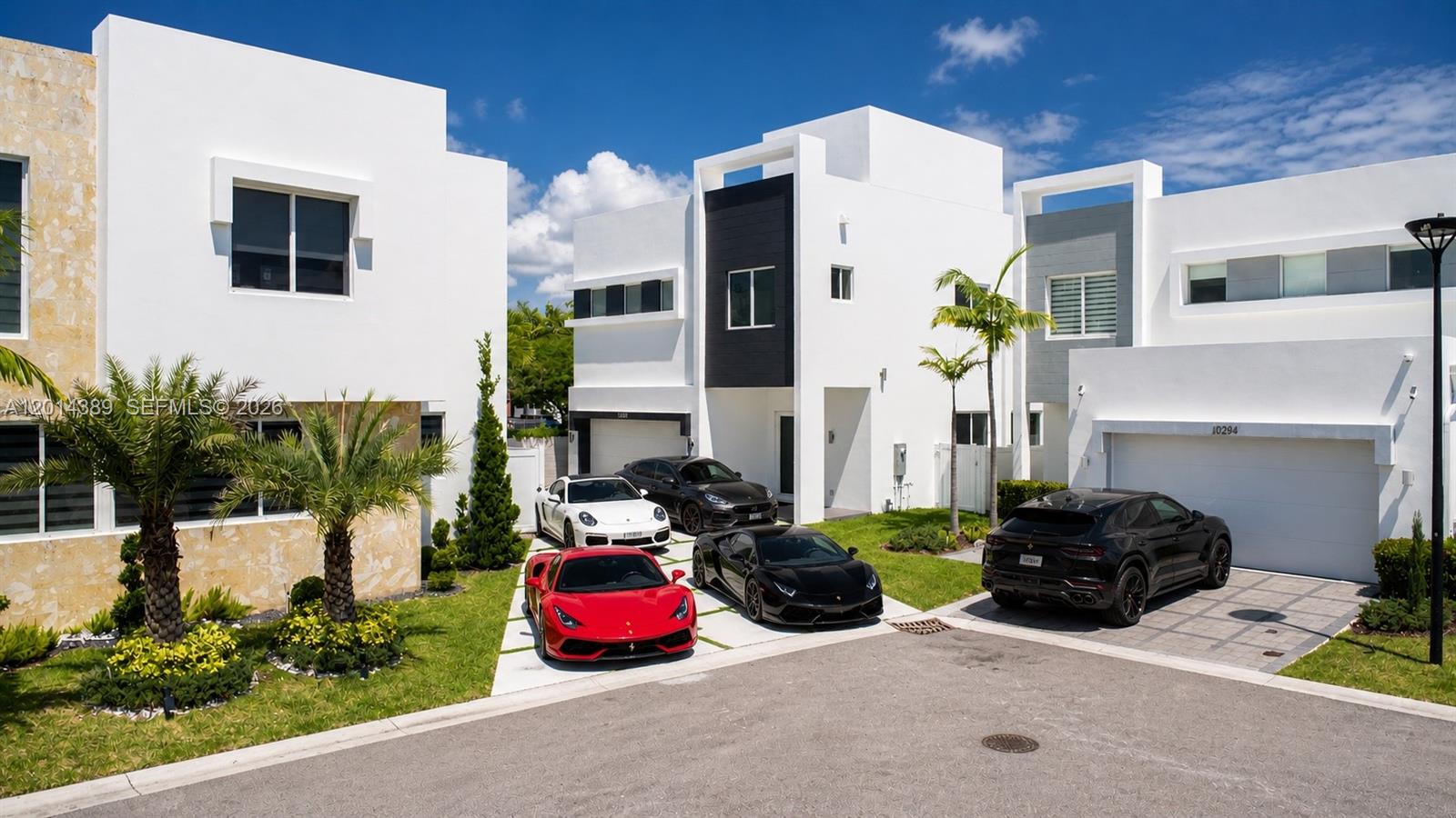 Brand new 2026 luxury residence in Doral a rare opportunity as the only newly constructed luxury home currently available in the entire area. This modern masterpiece features an open-concept design with abundant natural light and beautiful pool views from both the kitchen and main living areas, creating a seamless indoor-outdoor lifestyle.One of the most exceptional features of this home is its expansive driveway, accommodating up to 6 vehicles, in addition to a 2-car garage — a true rarity in Doral. The property offers 5 bedrooms, with 4 featuring en-suite bathrooms, providing comfort, privacy, and convenience for family and guests.Thoughtfully designed across multiple levels, the home includes a laundry room located on the third floor for added functionality. Located within a private, gated community with security and high-end amenities, including a resort-style pool, fitness center, jacuzzi, game room, and more.Prime location just 1 mile from the Turnpike and 3 miles from Palmetto Expressway, providing easy access to all of Miami. Easy to show.