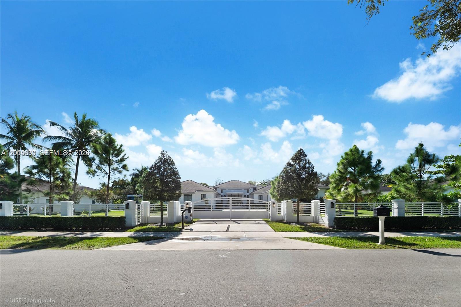 HUGE $$$ Price Reduction ! Custom Home 6500 sf on Acre- Gated Entry ,Cameras -Like New condition-Custom Home -Absolutely Gorgeous ! Immaculate - 6 bedrms 8 baths, Dramatic Front Entry Glass doors,22 ft ceiling living rm, incredible heated pool-spa, outdoor Chef kitchen covered patio,outdoor lighting,cabana bath outside by pool, Fantastic floor plan with 6 bedrms 8 bths plus office/exercise room, housekeeper room, large laundry room with dog shower, spacious great room/family room with large screen TV, Deluxe Chef Kitchen with professional gas stove, Luxurious master bathroom with huge walk in shower multi spray heads with soaking tub, double vanities, Huge walk in closet formal dining room, Floors 48 x 48 porcelain Tile, All Kohler plumbing fixtures, Sub Zero refrig and separate freezer, large wine cooler, pantry, WOW kitchen, countertops and cabinets- lots of storage- Direct underground gas line connected to city gas, 2 tankless water heaters, generator whole house, Sonos sound system in and out , Gated entry with security cameras, professional landscaping, MUST SEE !   NO FLOOD Insurance needed - Big Saving -  THE DEAL AND STEAL OF PINECREST - Hurry -Priced SELL Today