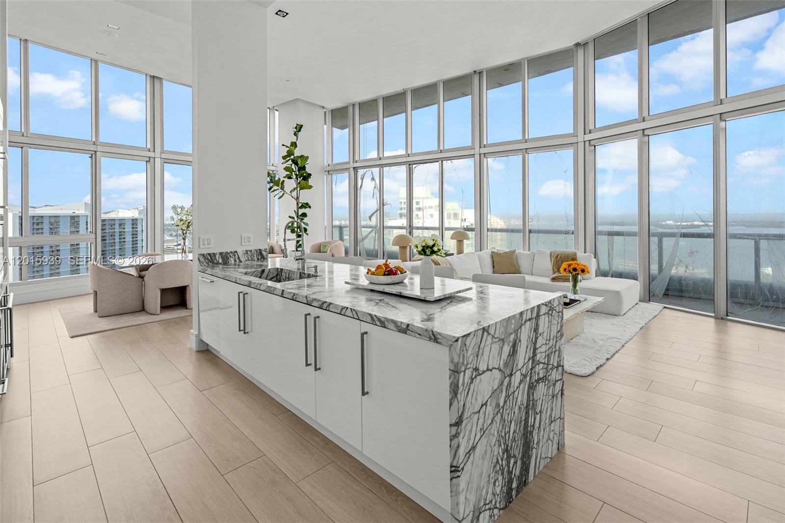 Icon Brickell APT 4101 is a corner-unit that that offers 180+ degrees of ocean views and ceilings so tall you’ll need scaffolding to change a lightbulb. The 55-foot long balcony is great for sunrise coffee or casual walks if you’re just shy of your daily step count. The 3-br was thoughtfully converted into a 2-br to create the largest living room in all of Brickell, which works well because now the in-laws will have to get a hotel. Amenities include a fitness center and the largest residential pool in the US, not to be confused with the ocean. The world-class spa is a great place to relax and enjoy your mortgage. Long gone are the days living above 7-Eleven as the building is home to some of the finest restaurants in Miami such as Cantina La Veinte, Cipriani, The Living Room, and CÉ LA VI.