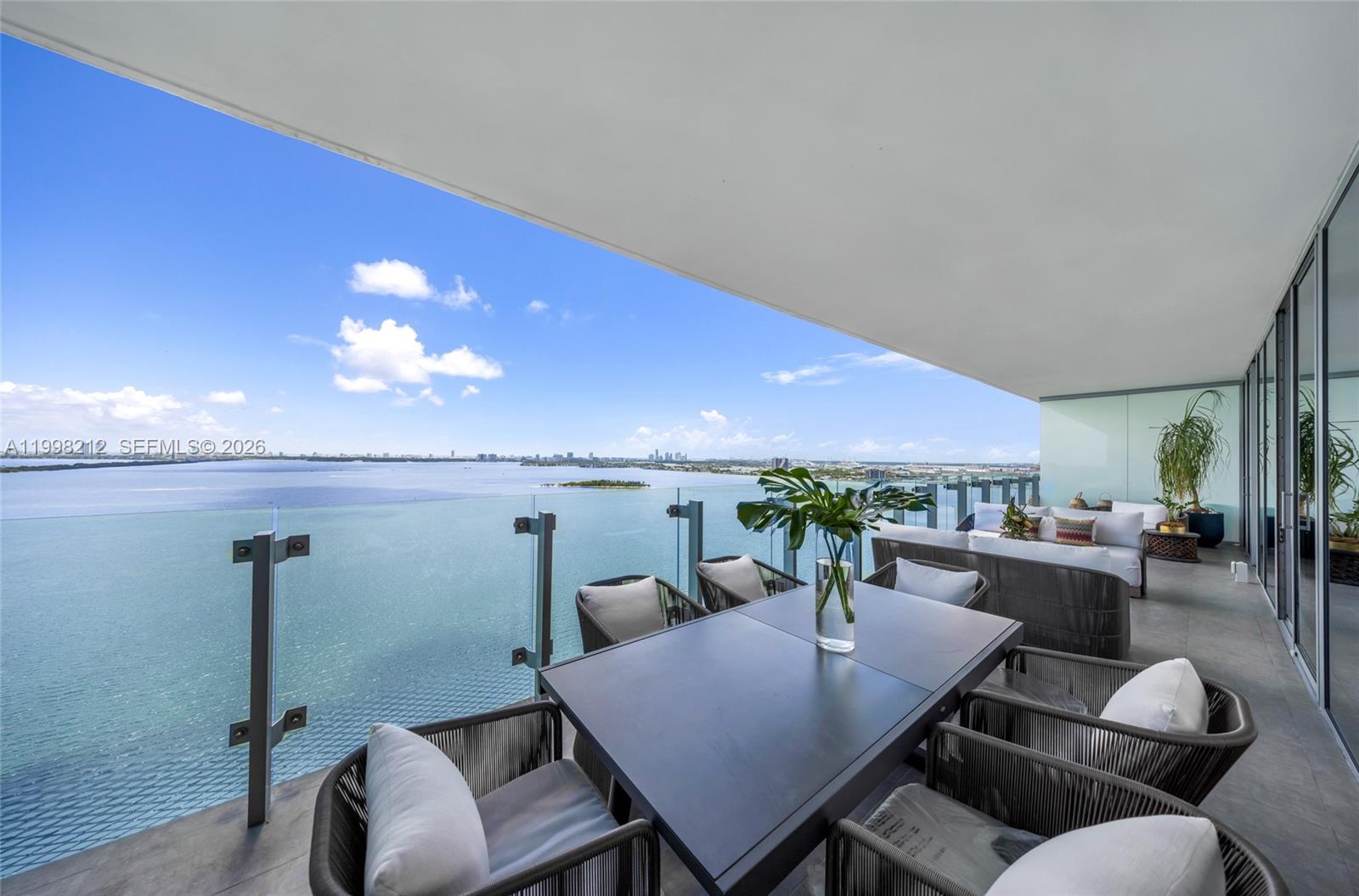 Fully upgraded and located in the prestigious Missoni Baia, this elegant residence offers three spacious bedrooms with walk-in closets and three and a half bathrooms. A private elevator opens into an exclusive foyer, creating a refined sense of privacy and arrival. The unit features a large balcony with stunning water views, perfect for relaxing or entertaining. Inside, you'll find a generously sized laundry room with ample storage, along with two assigned parking spaces for added convenience. Residents enjoy three full floors of resort-style amenities, including a waterfront gym, pools, tennis courts, movie theater, lounges, and BBQ areas. The building also provides 24/7 concierge service and valet parking, delivering a seamless and luxurious waterfront lifestyle.