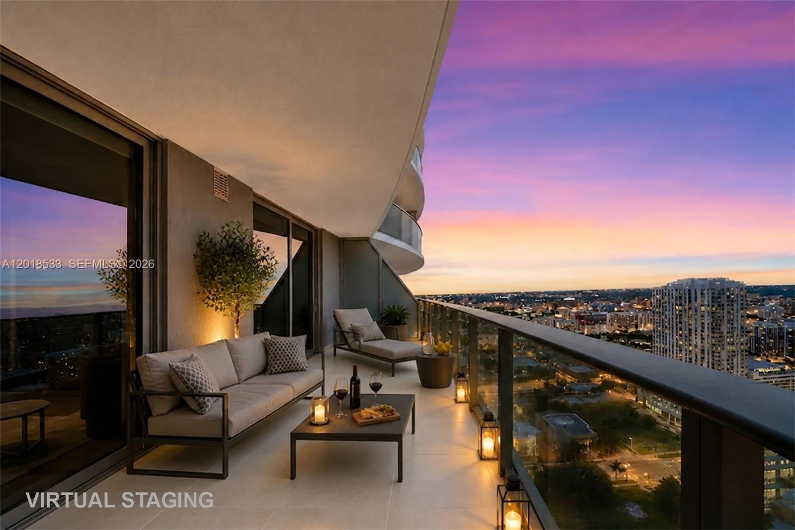 Exceptional high-floor 1-bedroom, 1.5-bath residence located on the 40th floor of Aria on the Bay, offering unmatched sunset vistas, glowing twilight skyline views, and partial bay exposure in the heart of Edgewater. Floor-to-ceiling glass windows fill the residence with natural light while showcasing expansive city and water views that create a true luxury skyline experience. Built in 2018 with modern CBS construction, this residence features contemporary finishes, premium appliances including refrigerator, range, oven, microwave, dishwasher, washer, and dryer, plus an elegant open-concept primary bath design. A rare advantage for this 1-bedroom layout is the inclusion of 2 assigned covered parking spaces, a highly valuable feature in the building. Perfectly positioned directly across from Margaret Pace Park, residents enjoy the ideal balance of waterfront serenity and vibrant urban living just minutes from Wynwood, Design District, Downtown Miami, and Brickell. Full access to resort-style amenities includes sunrise and sunset pools, state-of-the-art fitness center, yoga studio, spa, social room, screening room, game room, library, and 24/7 concierge and security. Excellent opportunity for both end users and investors, with tenant in place through April 2027 providing immediate income potential.All dimensions/features are approximate. Buyer & buyer agent to verify. Broker/owner make no warranties.