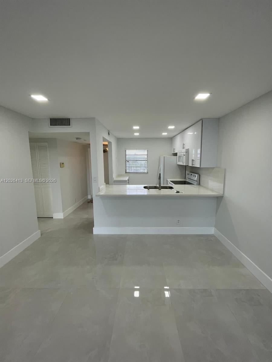 Tangerine Condominium Six