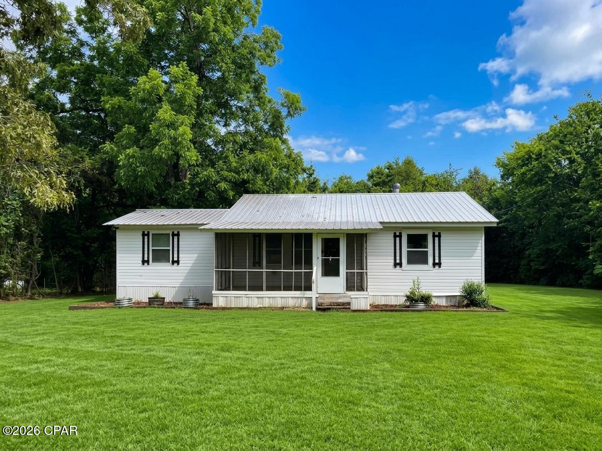 1st image of 7213 Shady Grv Rd, Grand Ridge, FL 32442 | MLS# 790560