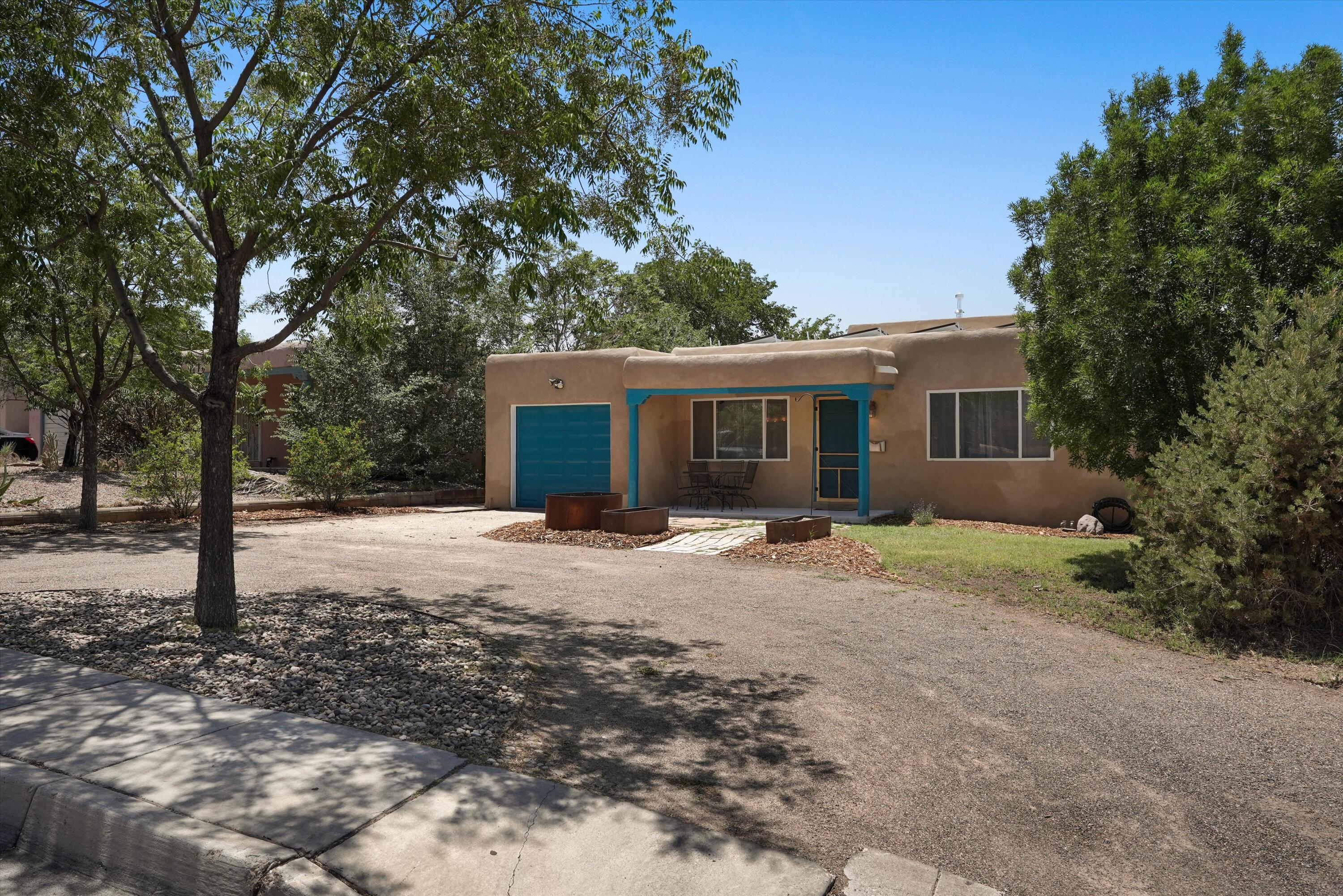 Photo 2 of Sale Pending at 813 Girard Blvd SE, Albuquerque, NM 87106 | MLS# 1104839 | Listing updated on 2026-09-12