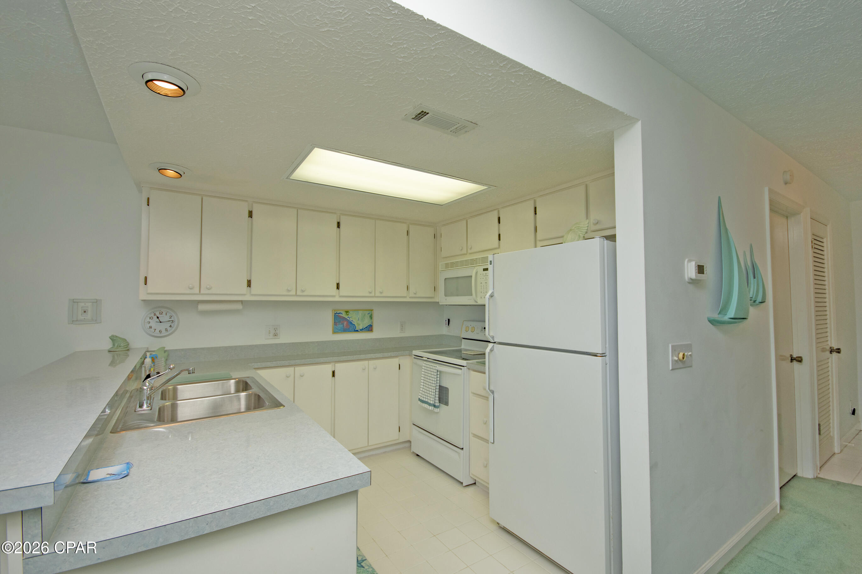 7719 Surf Drive, Panama City, FL 32408 thumbnail, photo 28 of 77