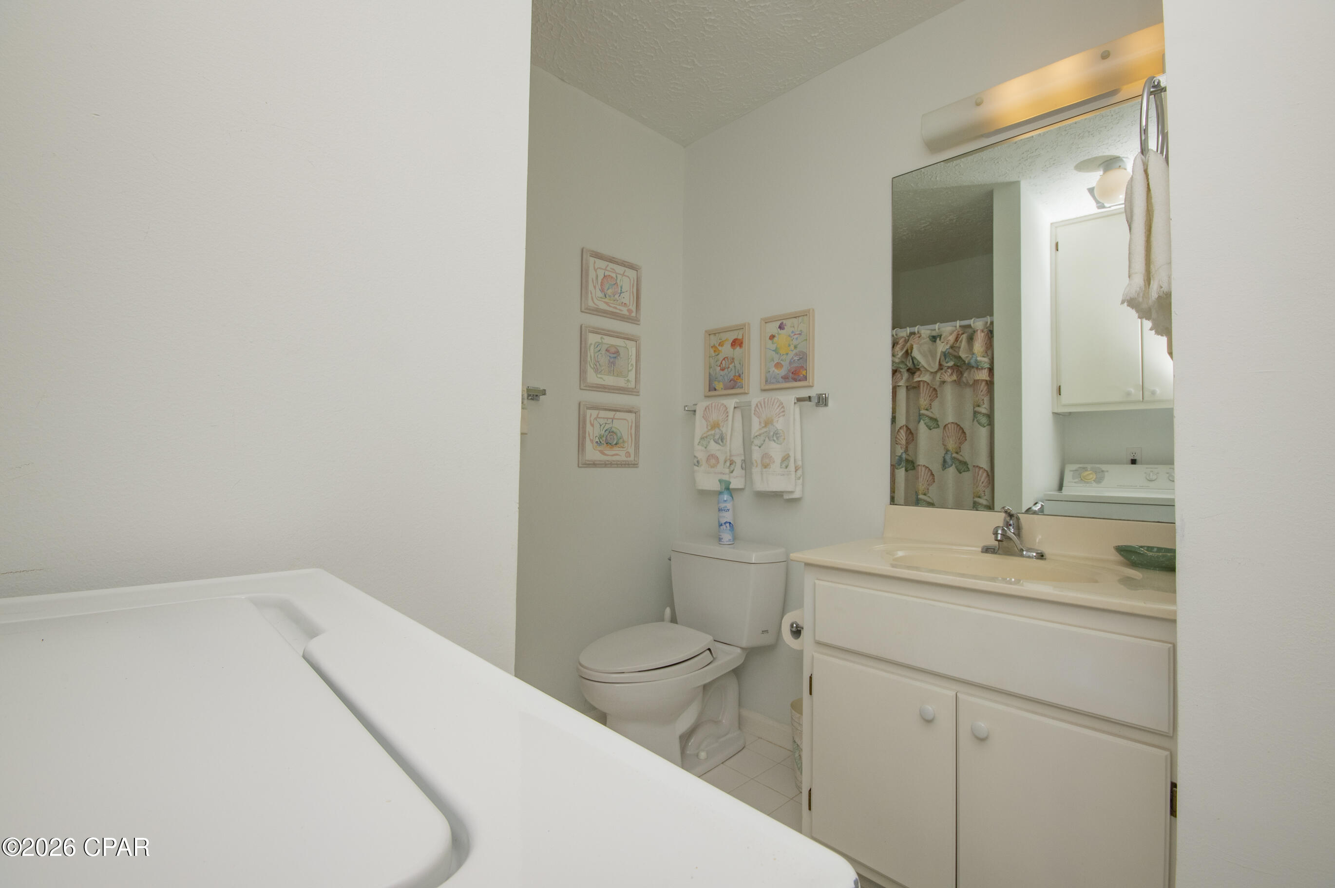 7719 Surf Drive, Panama City, FL 32408 thumbnail, photo 31 of 77