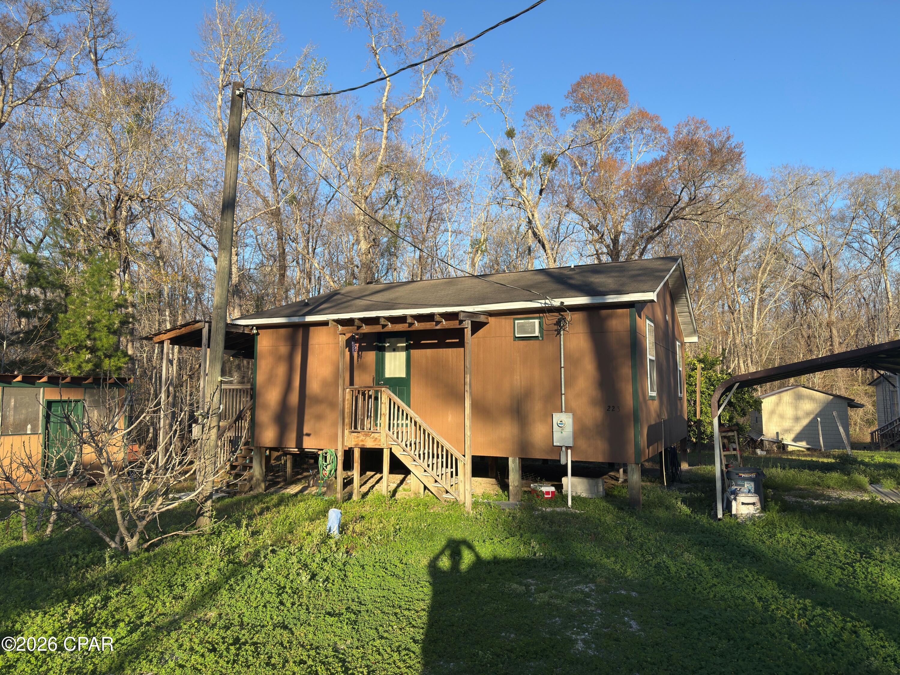1st image of 223 Highroller Soldier Dr, Wewahitchka, FL 32465 | MLS# 792081