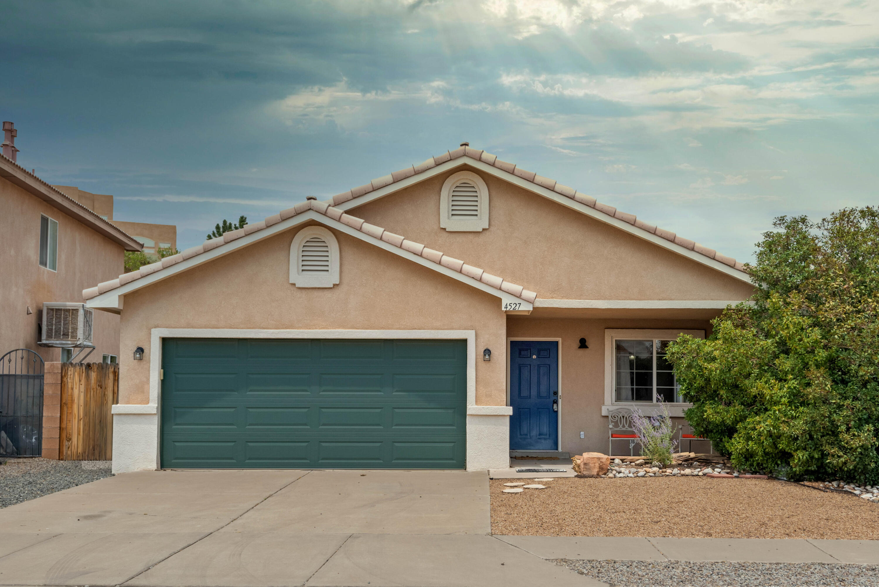 Welcome to this charming single-story home in Crystal Ridge! Conveniently located near shopping, dining, and everyday amenities, this home offers a bright, open floor plan with cathedral ceilings and arched doorways that create an inviting atmosphere. The spacious great room flows seamlessly into the dining area, while the breakfast nook provides a comfortable space for casual meals. Maple-tone laminate flooring in the main living areas and tile in the kitchen offer style and easy maintenance. Updated bathrooms feature vessel sinks, and the fully landscaped backyard includes a covered patio, creating a wonderful setting to relax or entertain throughout the year.