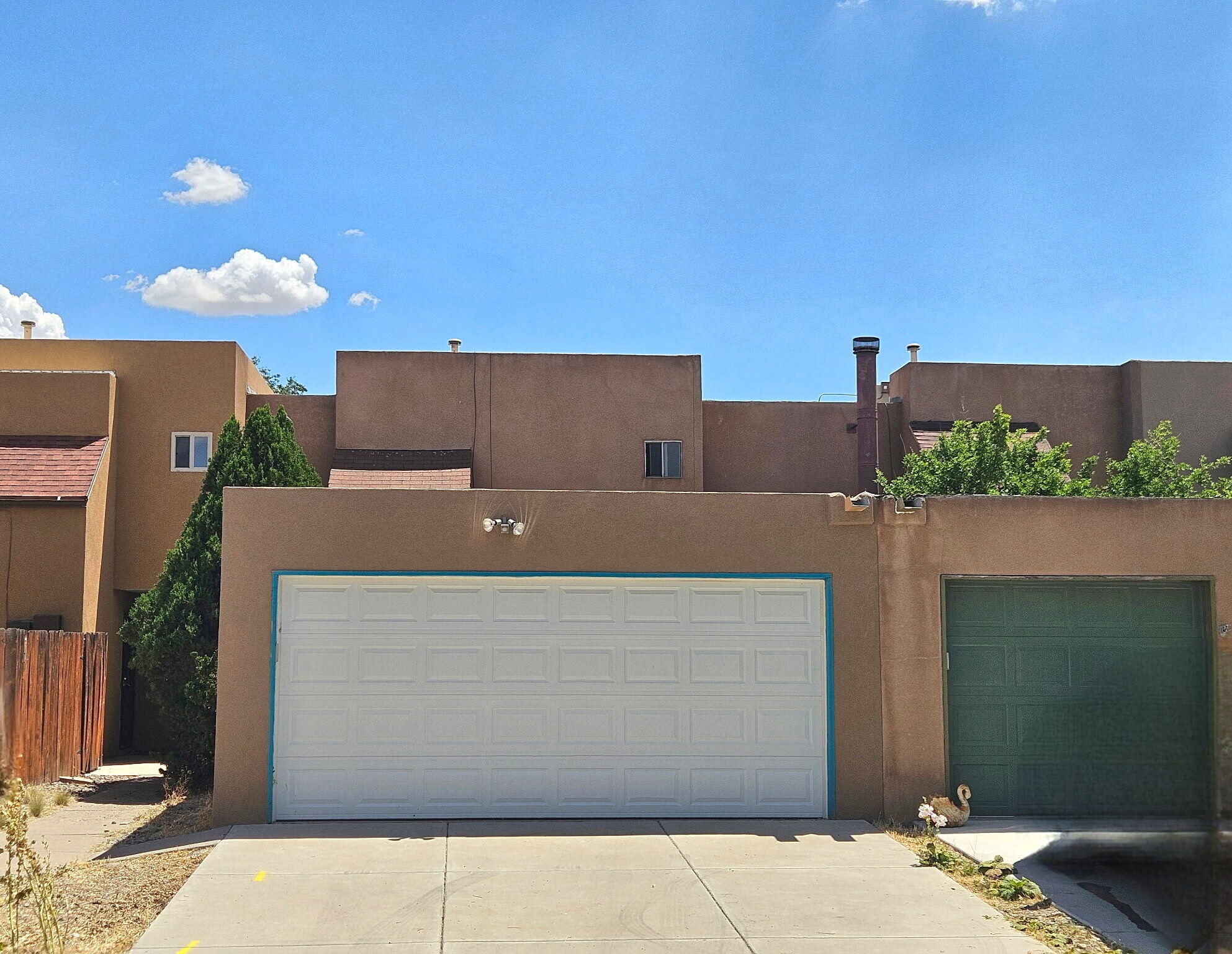 Rare opportunity to own one of the few townhomes in the community with a two-car garage with NO HOA! This well-maintained townhome features two spacious primary suites, each with a private bath, plus a convenient half bath downstairs. Enjoy tile flooring throughout the entire home offering beauty, durability, and easy maintenance. Relax in the private courtyard or entertain in the large backyard with plenty of space to enjoy the outdoors.Conveniently located near shopping, dining, parks, and freeway access, this home combines comfort, functionality, and a floor plan that's hard to find.