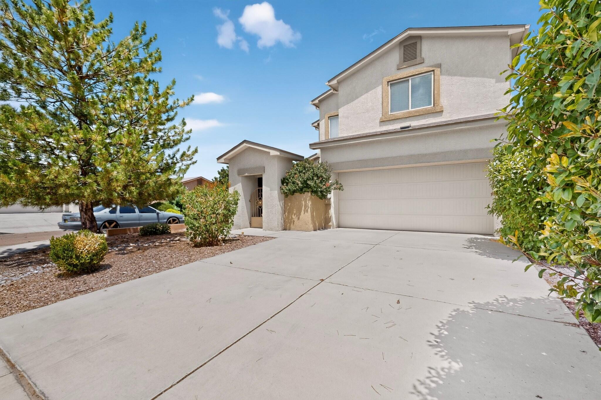 Welcome to this beautiful, modern, green built home that perfectly balances sustainable living with exceptional comfort. Located on a corner lot you'll enjoy the extra privacy, larger yard, and abundance of natural light from three sides of the property. Step right outside your door onto miles of interconnected multi-use paths that wind through the neighborhoods and desert landscape. Experience expansive views of the gorgeous Albuquerque skies, the city lights, and the majestic Sandia Mountains right from your primary suite and main living spaces.Equipped with a whole-house water softener and a kitchen reverse osmosis system. Features convenient gas hookups in kitchen and second floor laundry room.